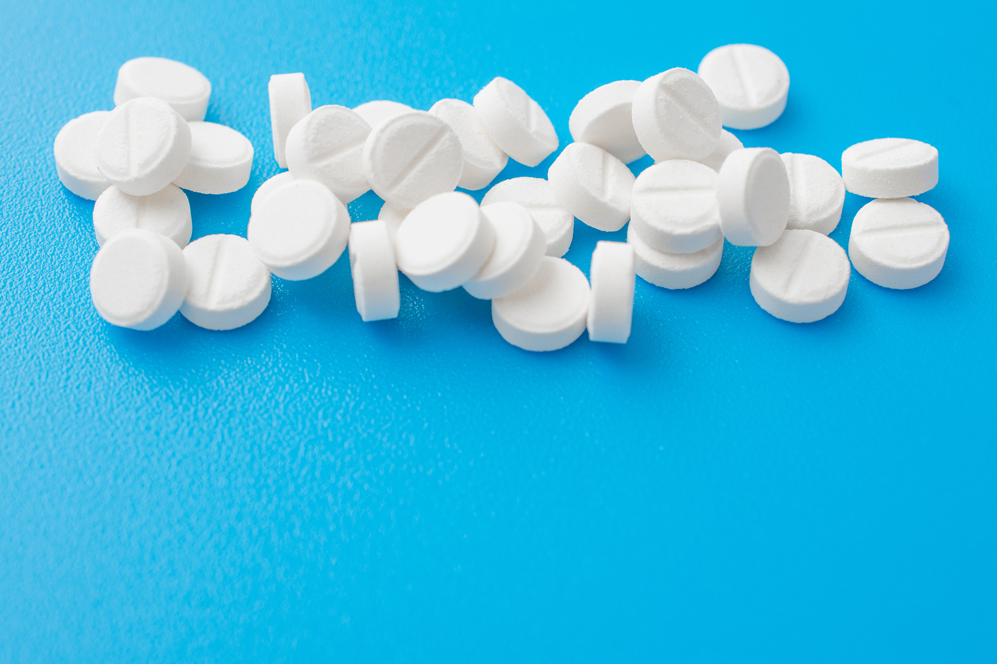 the pills on a blue