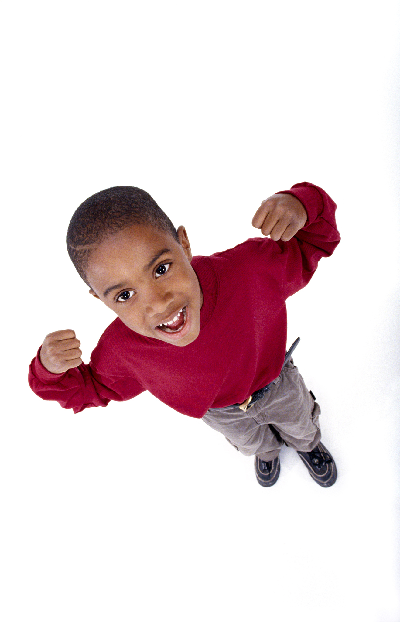 boy flexing muscles