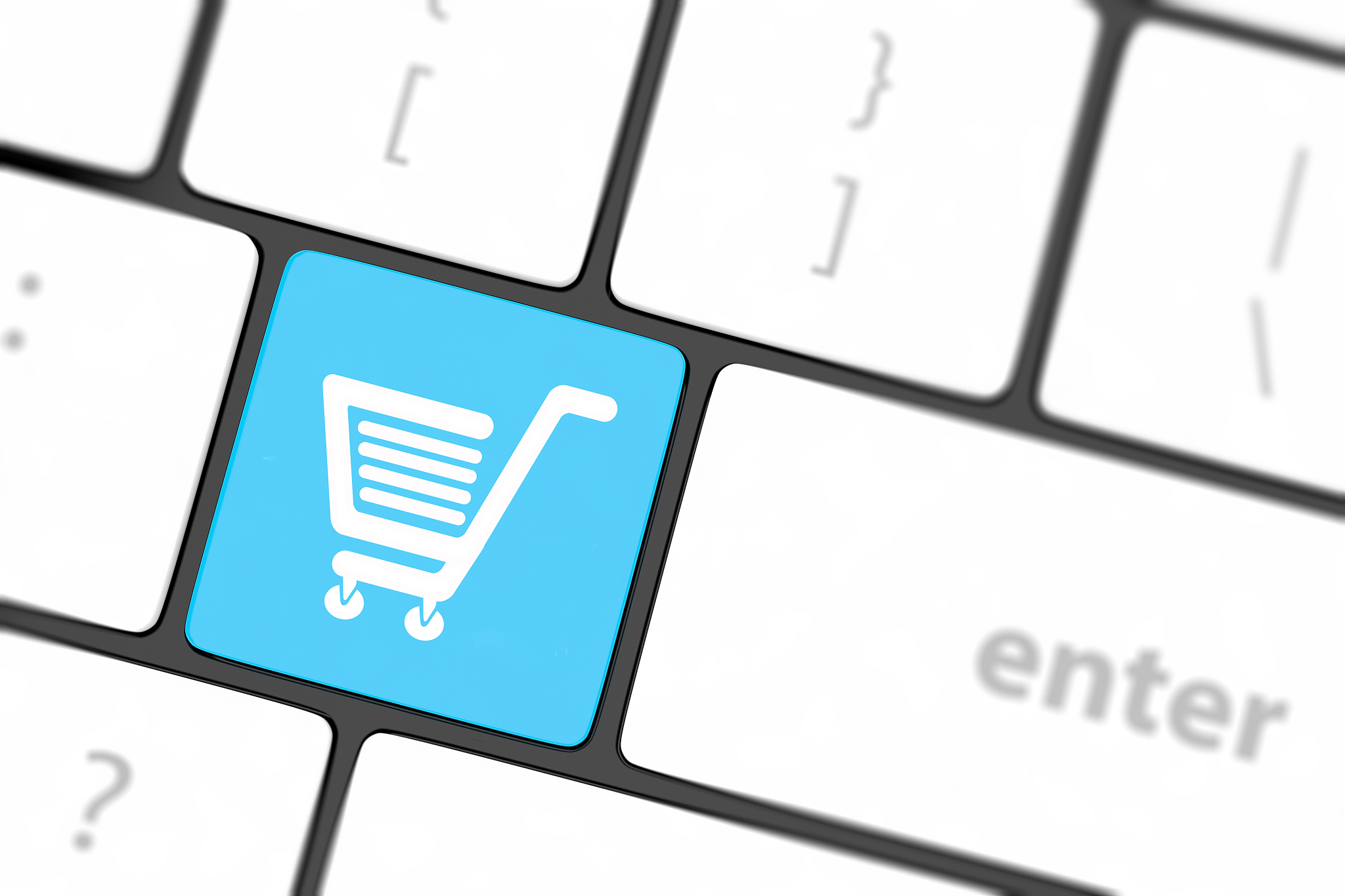 shopping enter button key on white keyboard