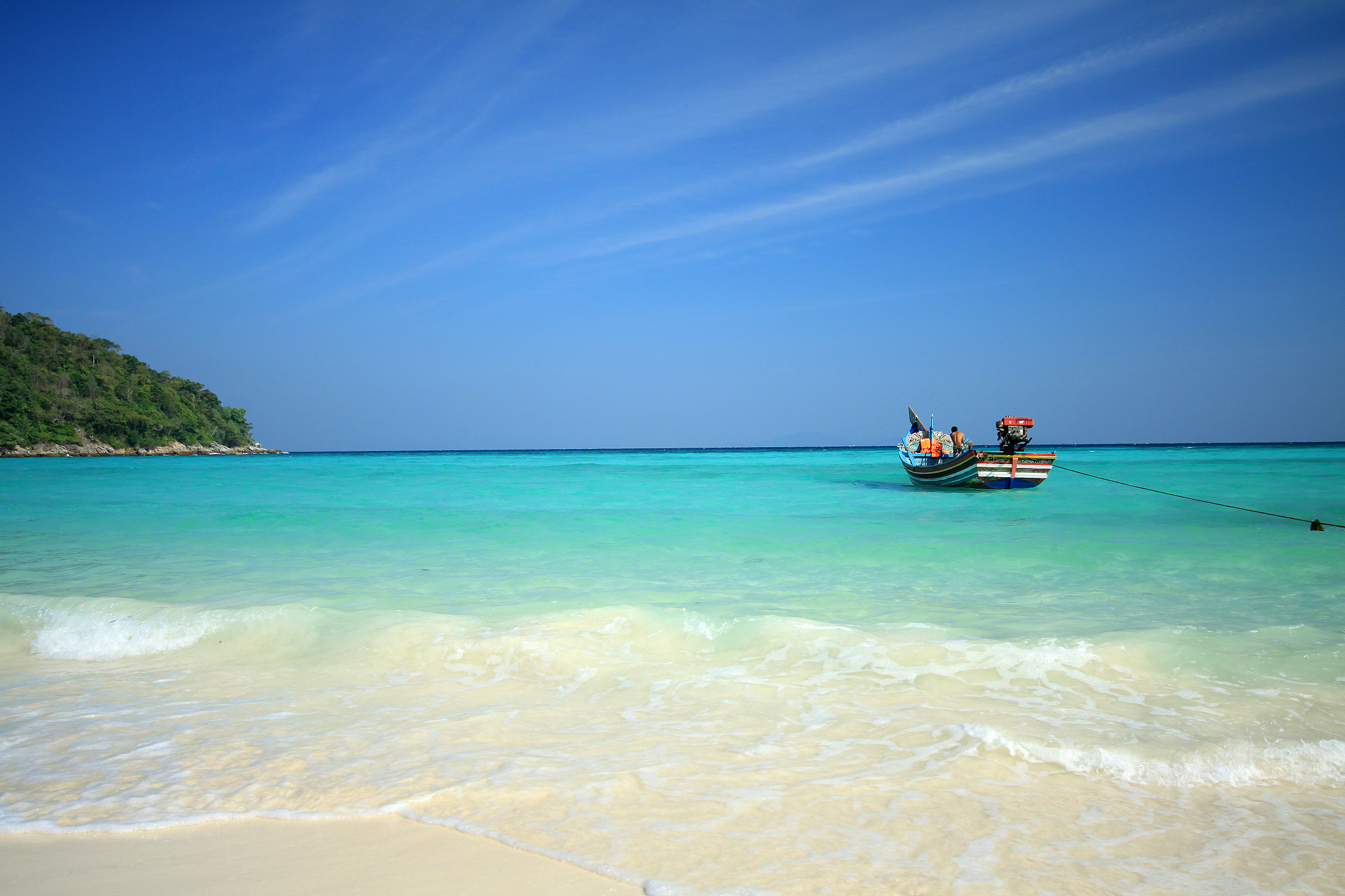 fishing boats at raya island of phuket thailand