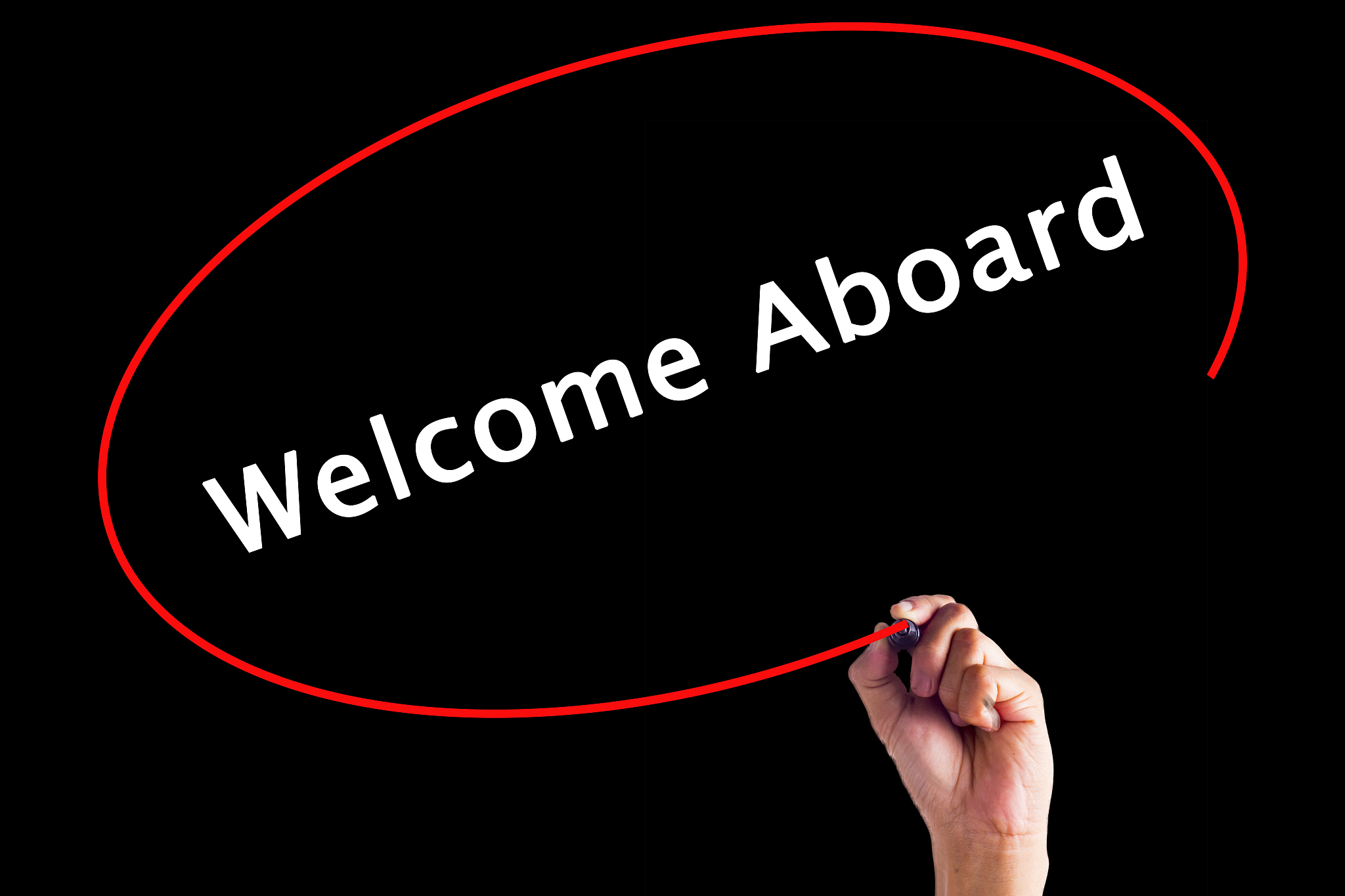 hand writing welcome aboard with a marker over transparent board