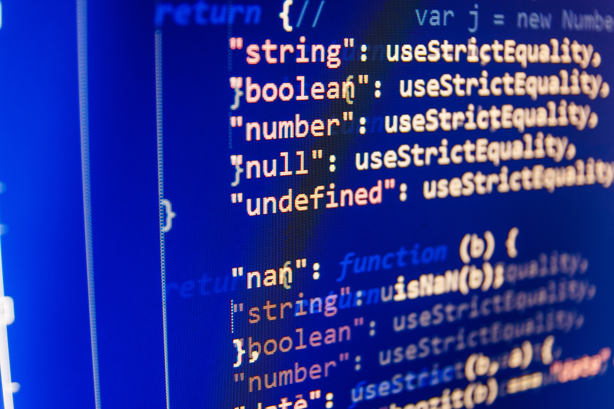 software developer programming code on computer