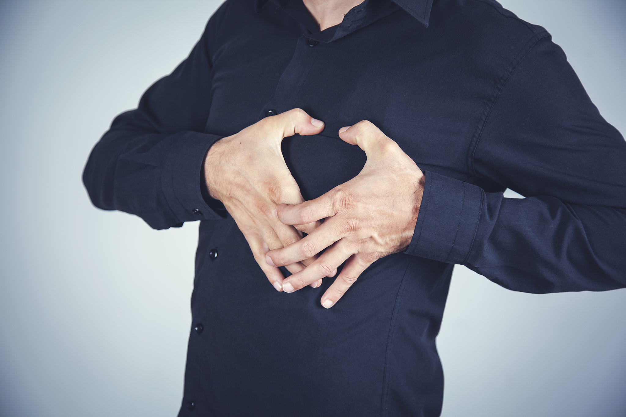 man hand in heart