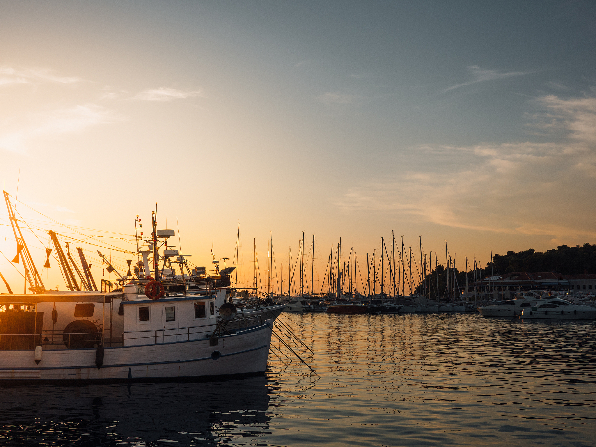 harbor at sunset in vrsar croatia