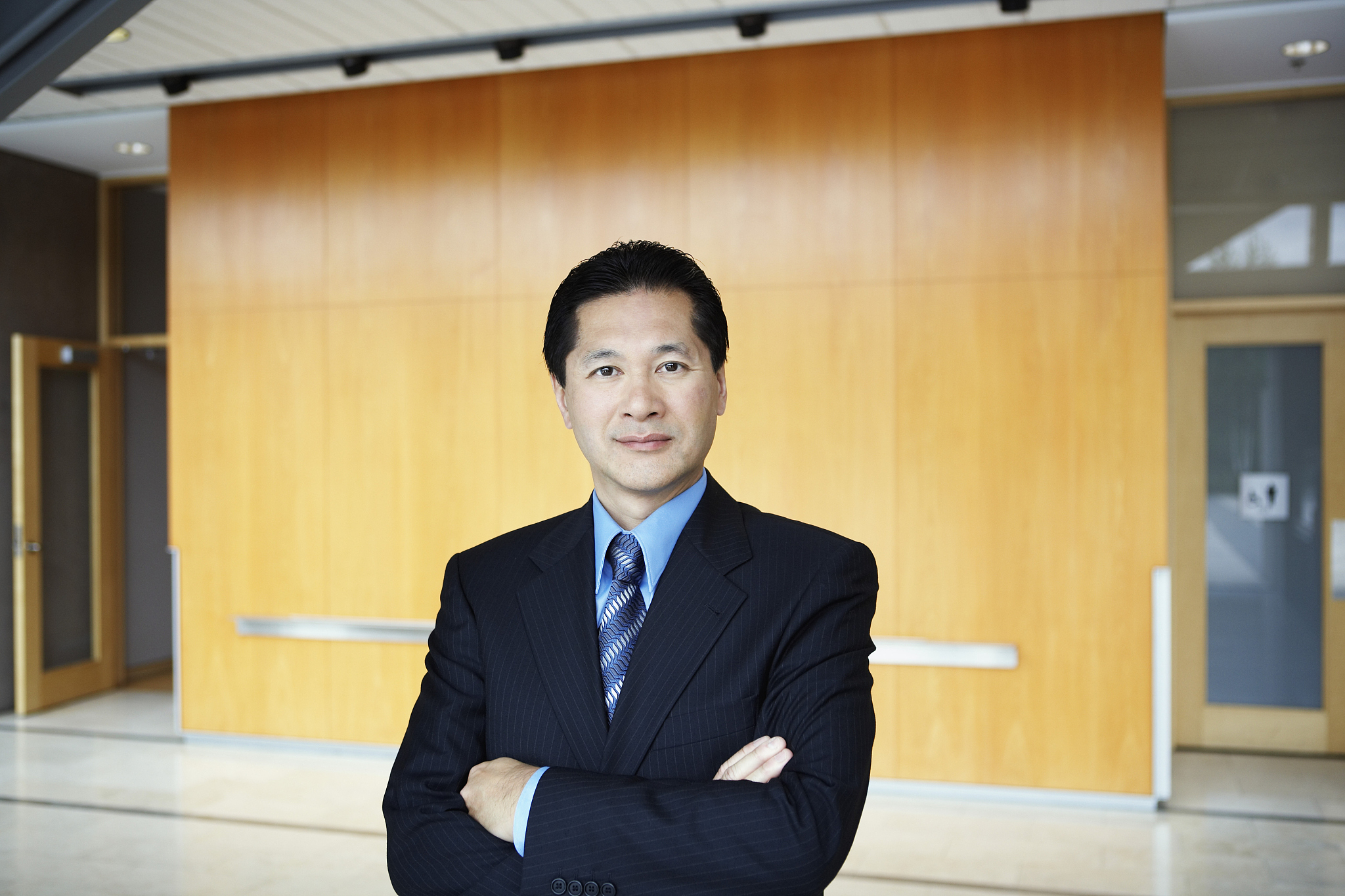 businessman with arms crossed