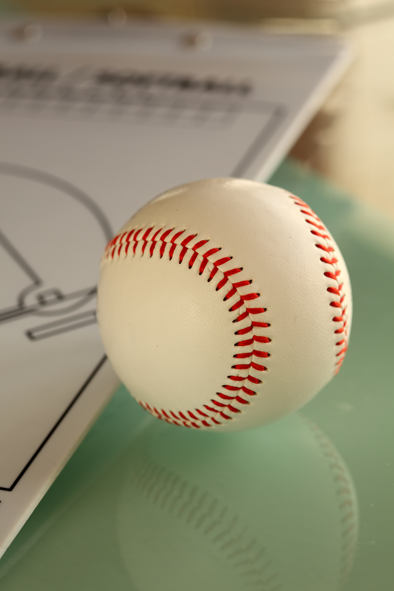 baseball and coach's clipboard