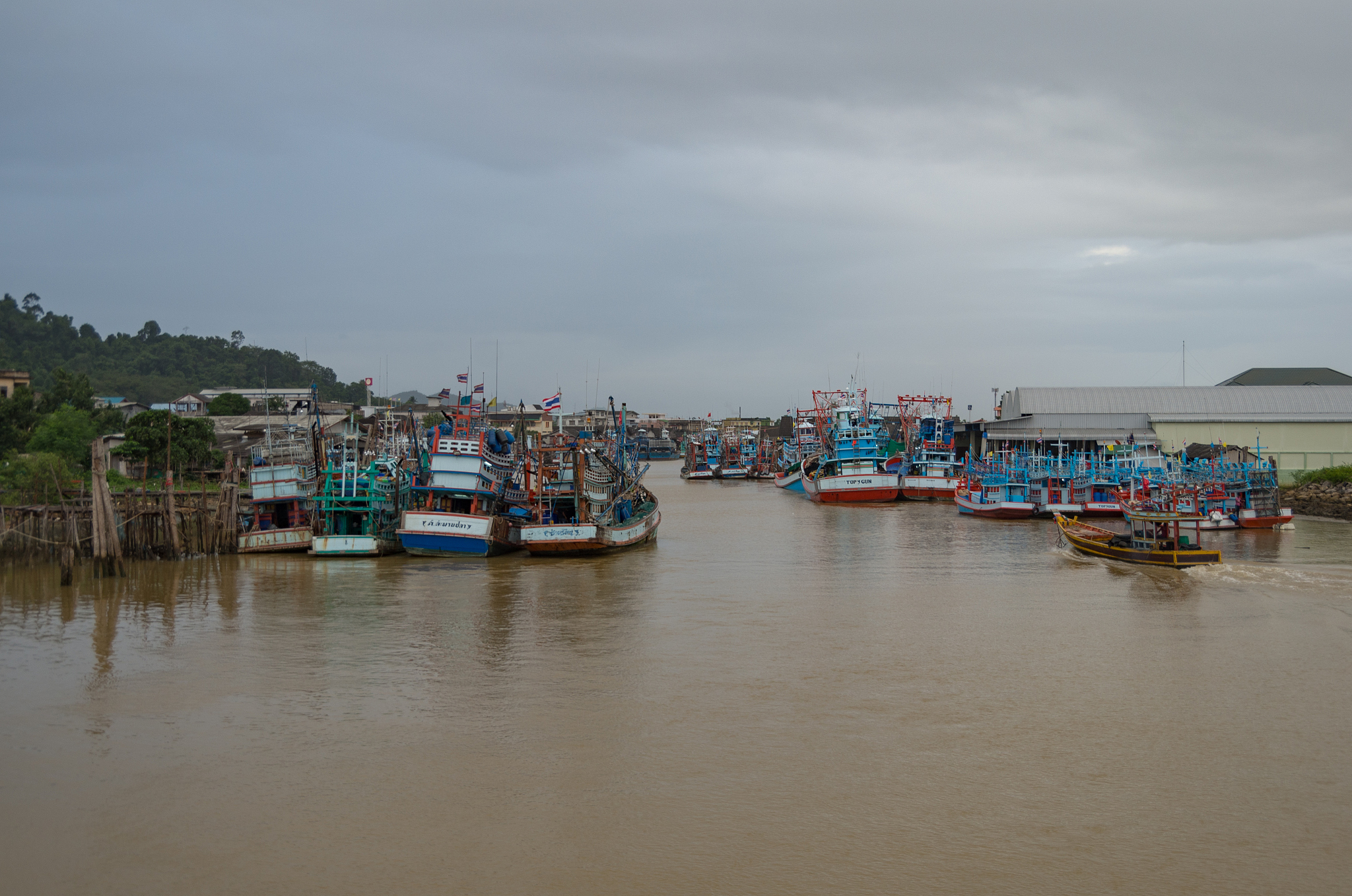 dirt water in a harbor in thailand