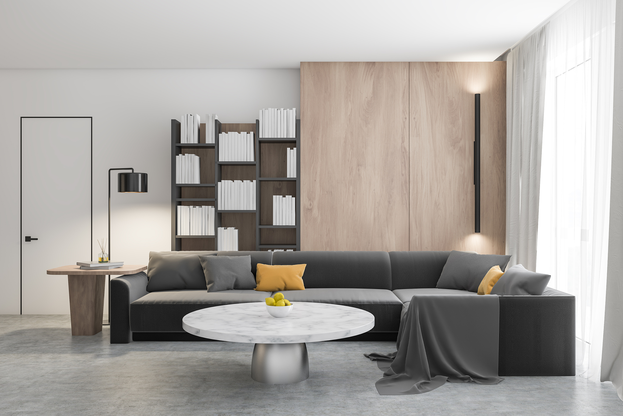 living room with gray sofa and bookcase