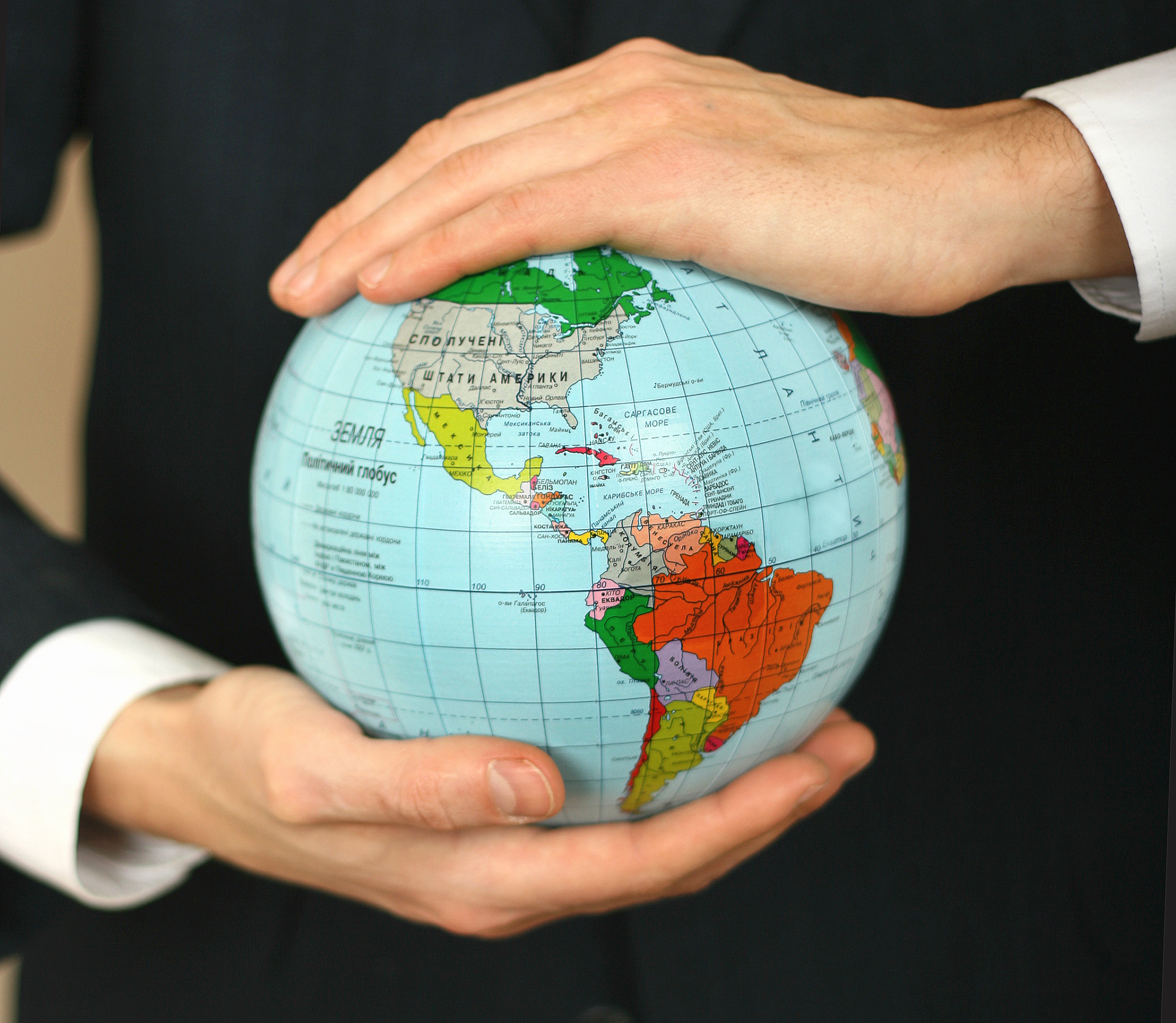 globe in hands