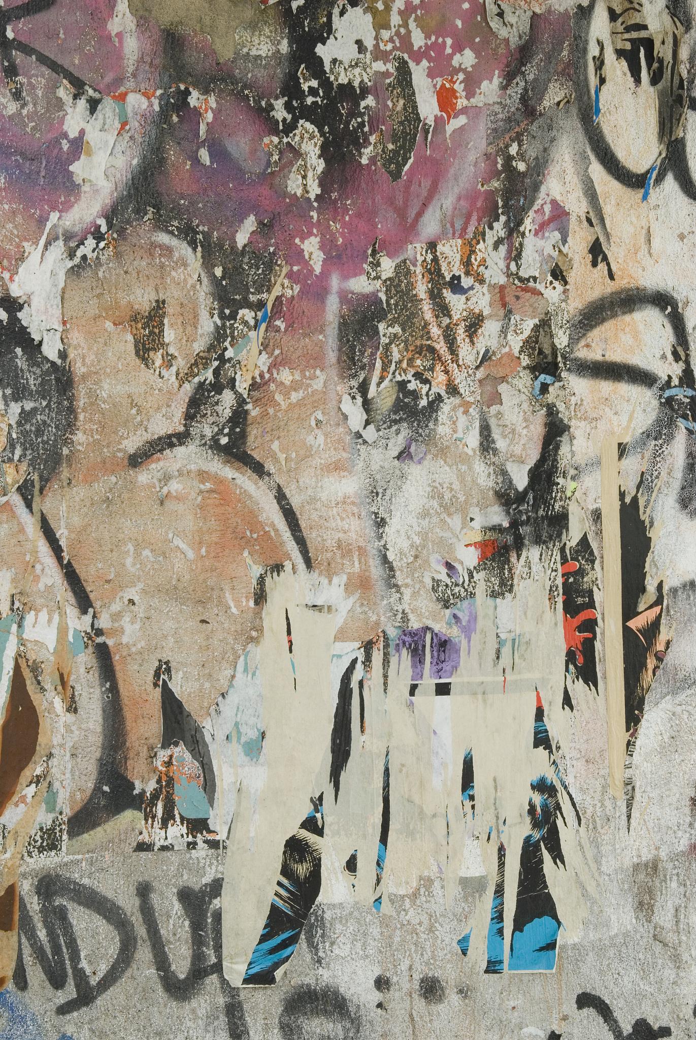 layers of graffiti on a wall, new york city