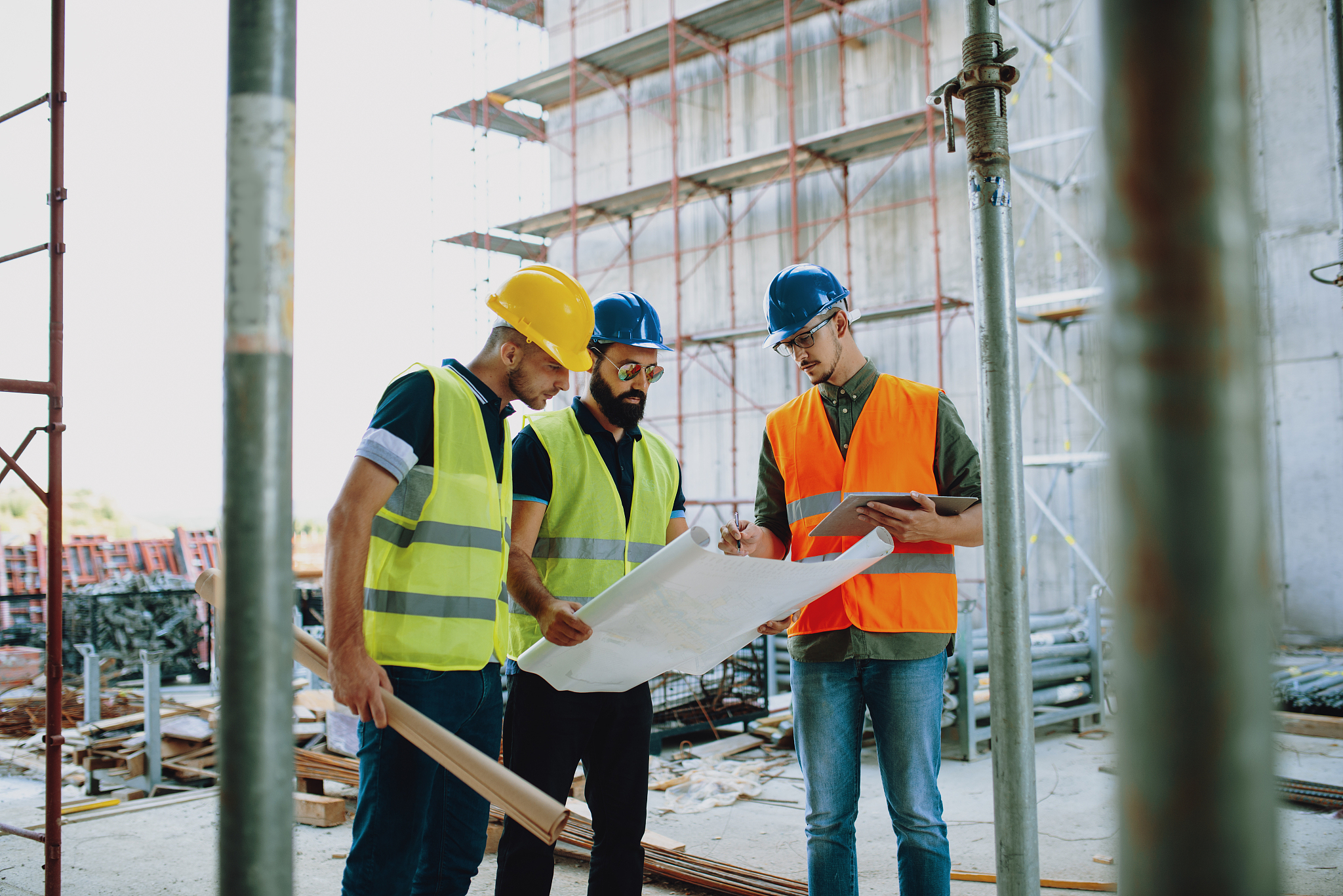 construction industry - architects and engineers working togethe