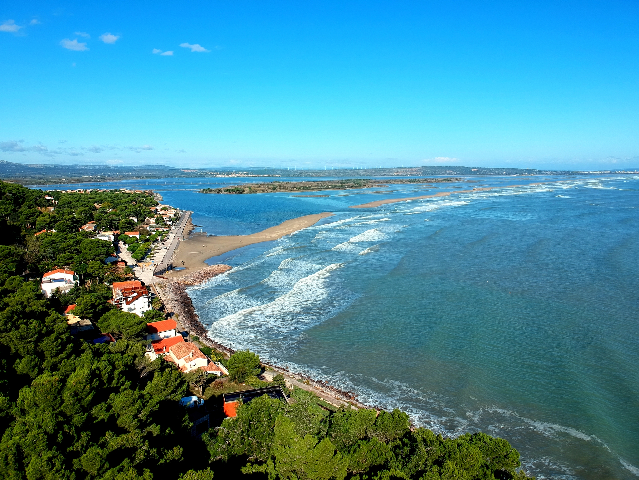 high angle view of sea against blue sky