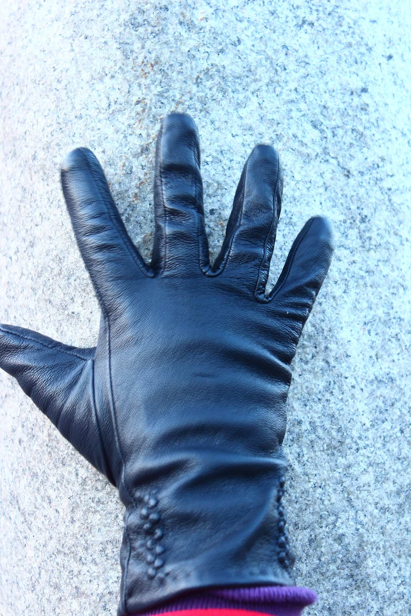 gloved hand