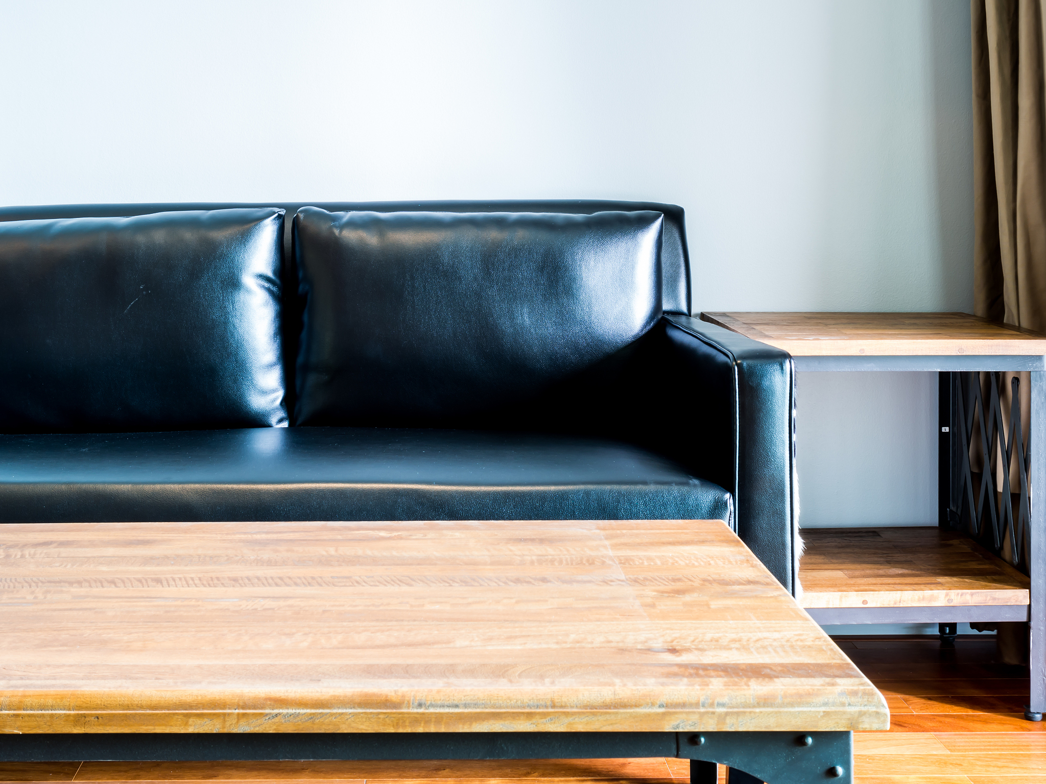 interior design of empty moderm room with black couch