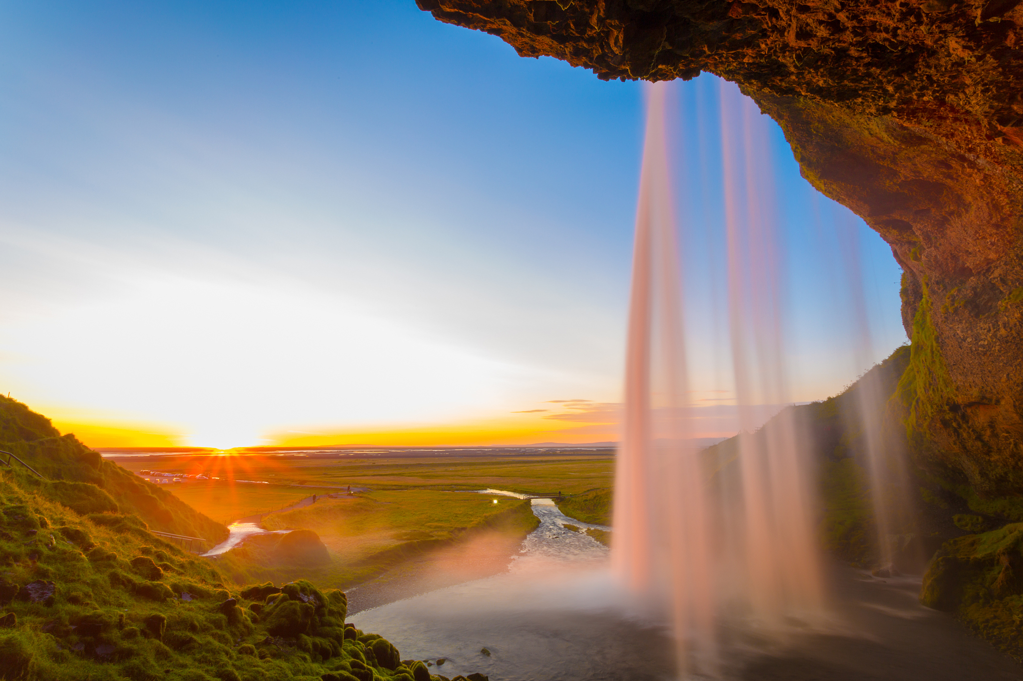 iceland, sunset behind the fall, seljalandsfoss