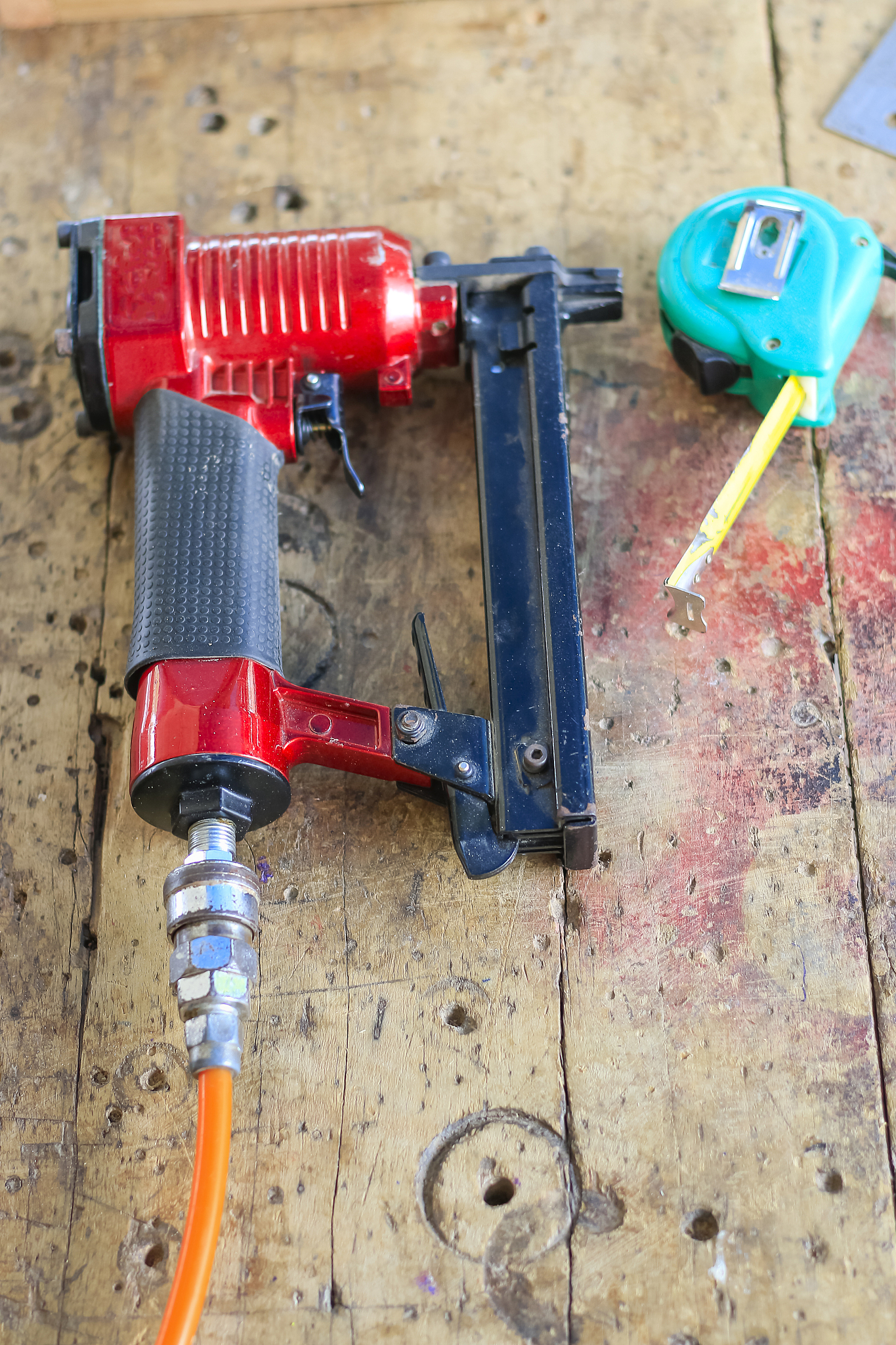 carpenters are using tools with wood working furniture.