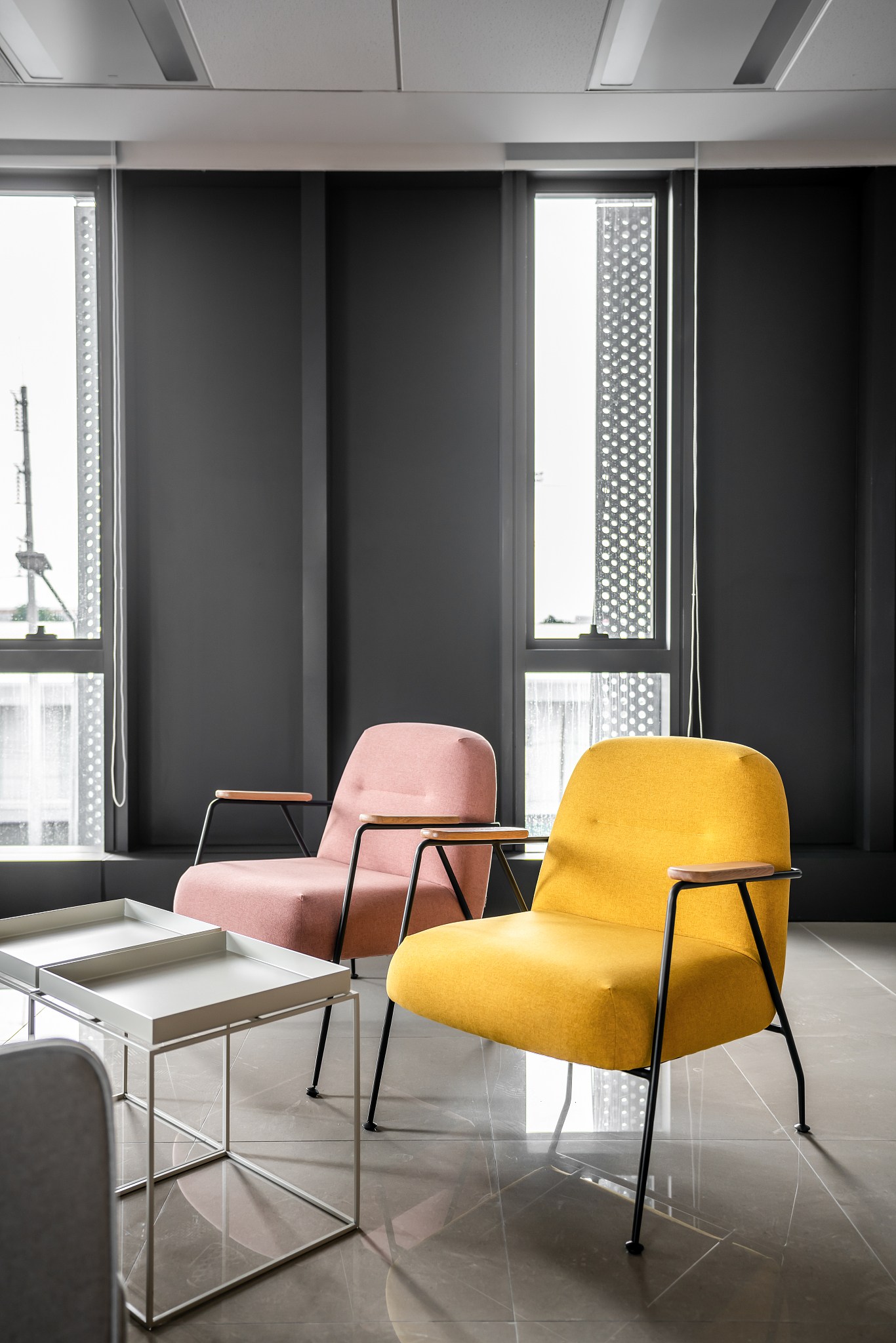 colorful armchair in minimal modern style with windows and black