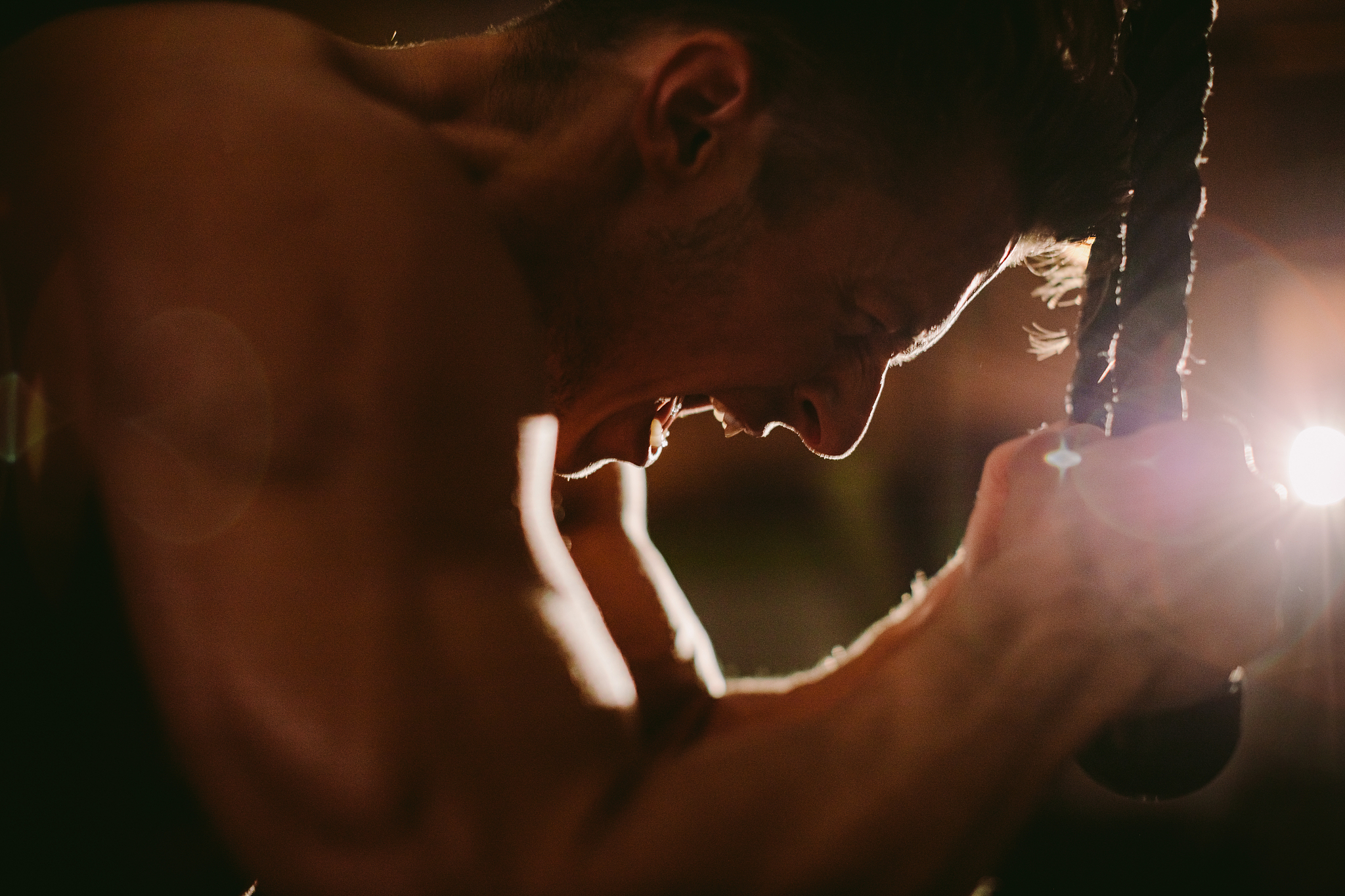 shirtless man exercising at home