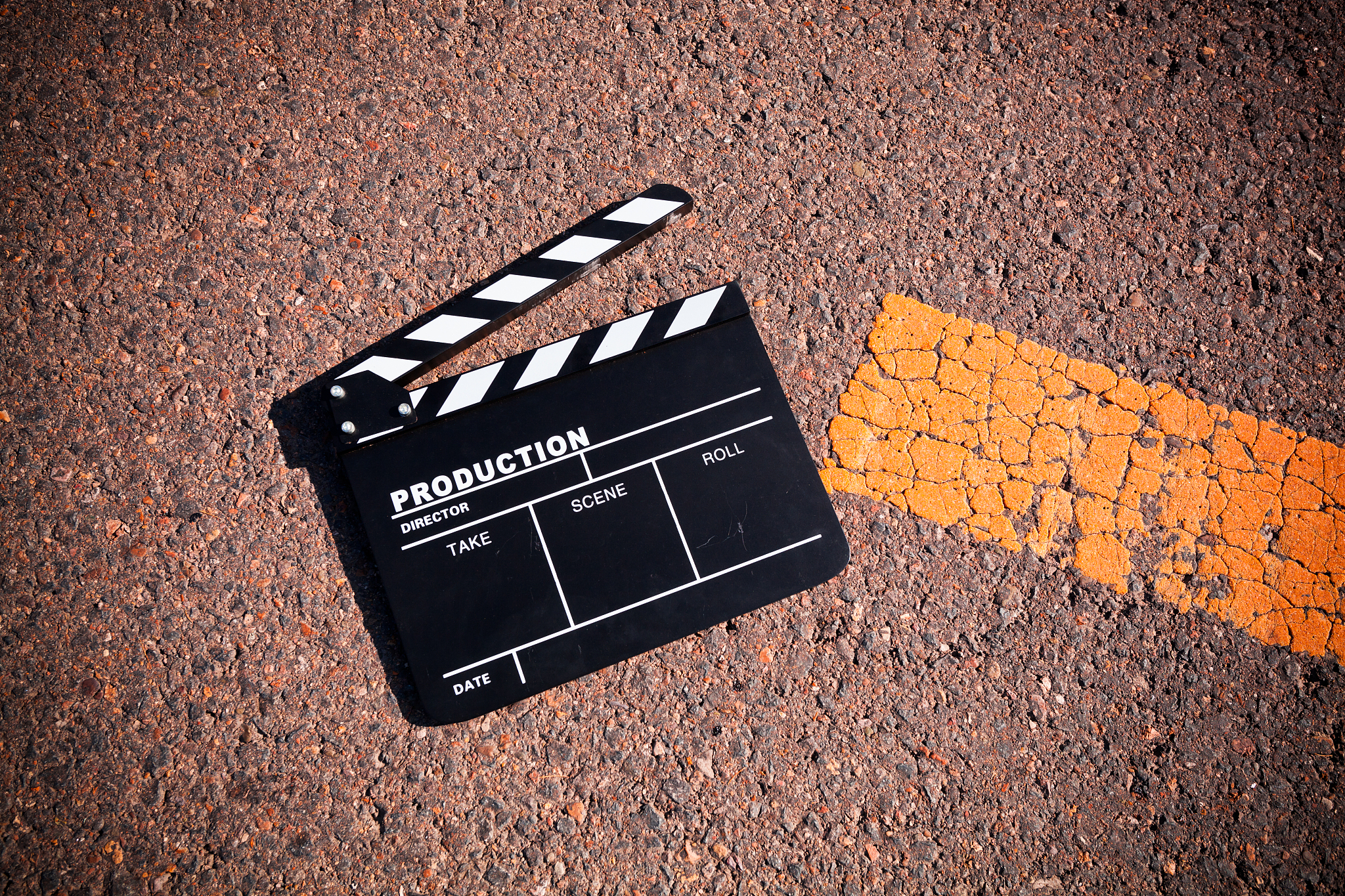 clapper board on ground