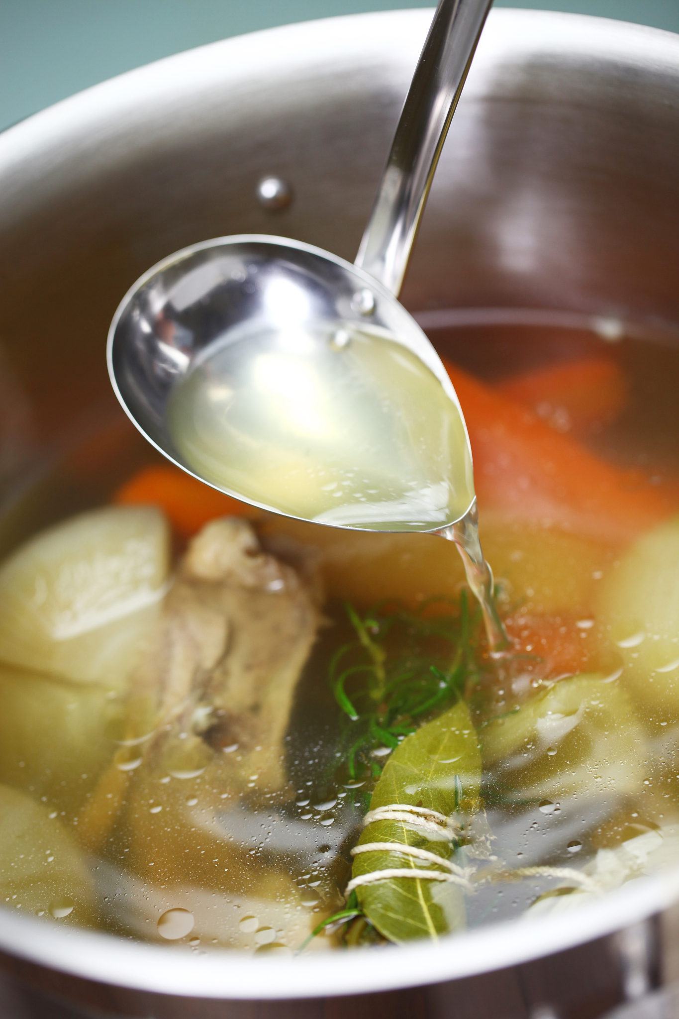 making chicken soup stock (bouillon) in a pot