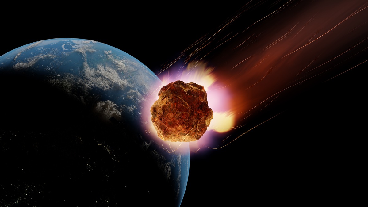小行星正飞向地球,在太空中留下明亮的轨迹.地球部分,