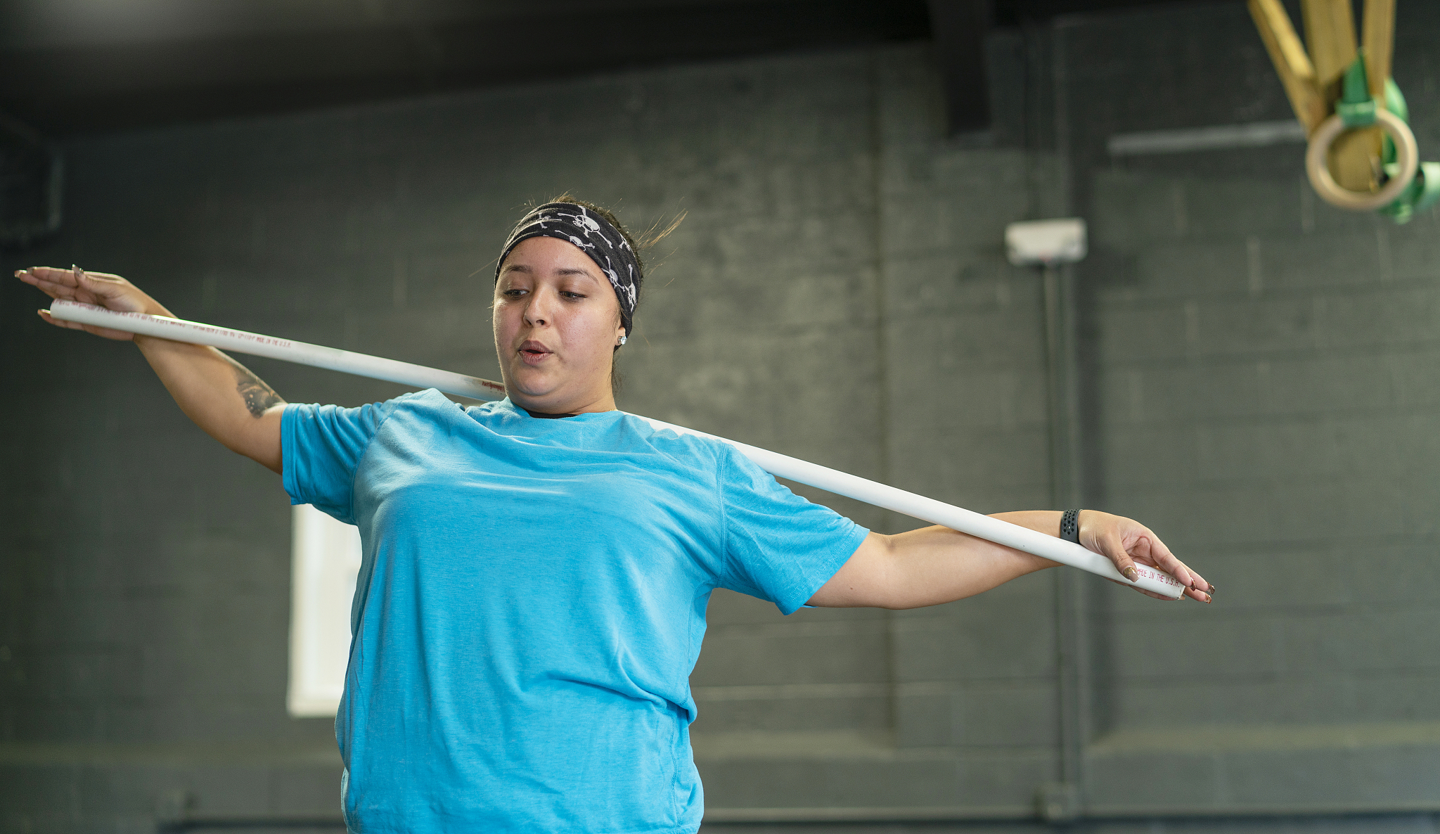 the young, beautiful cheerful body-positive latino woman doing s