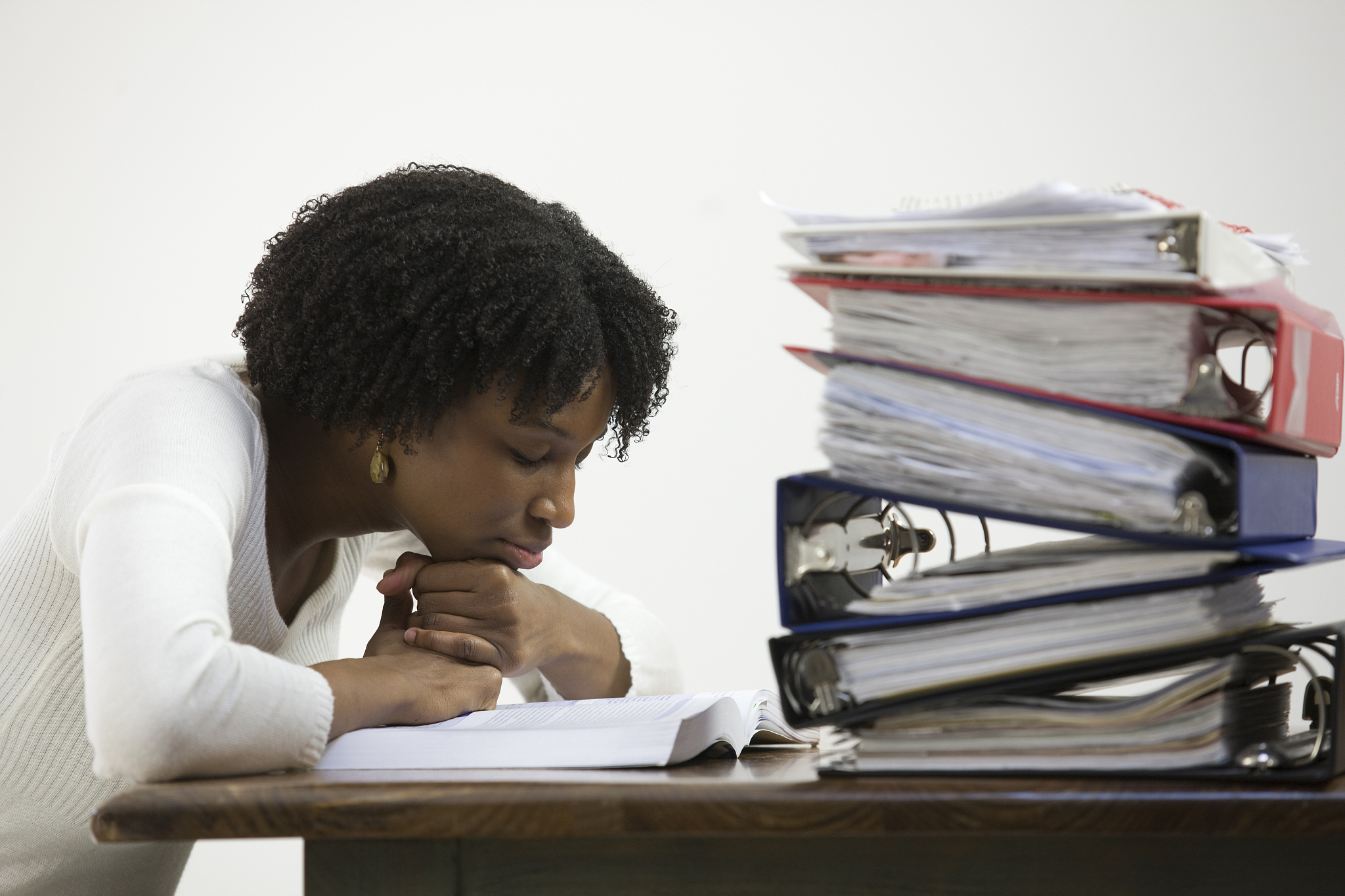 woman studying with books