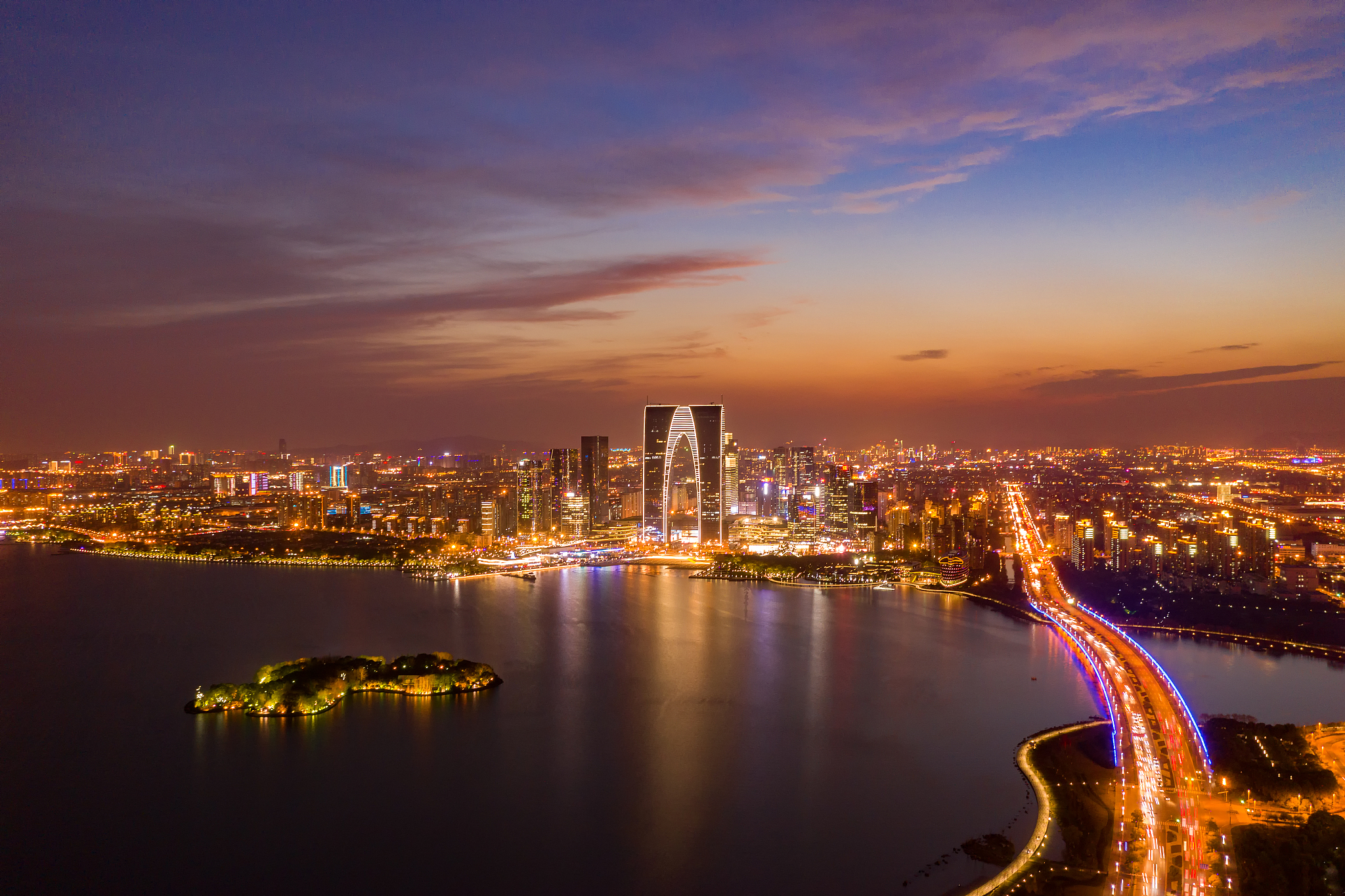 航拍苏州金鸡湖现代城市cbd夜景风光