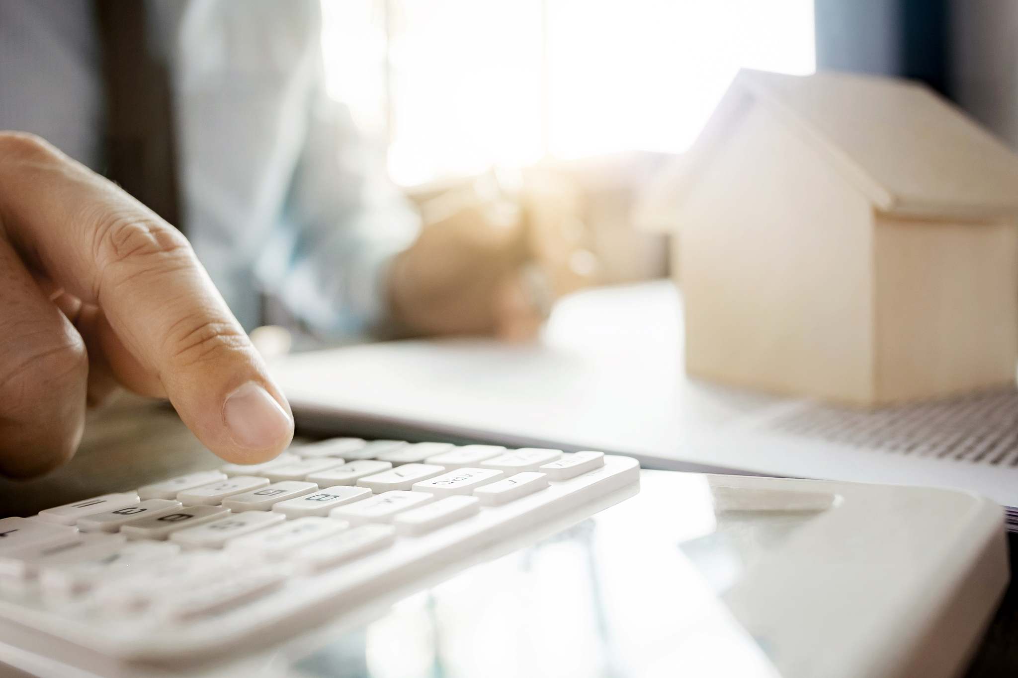 realtor calculating a estate or property value.