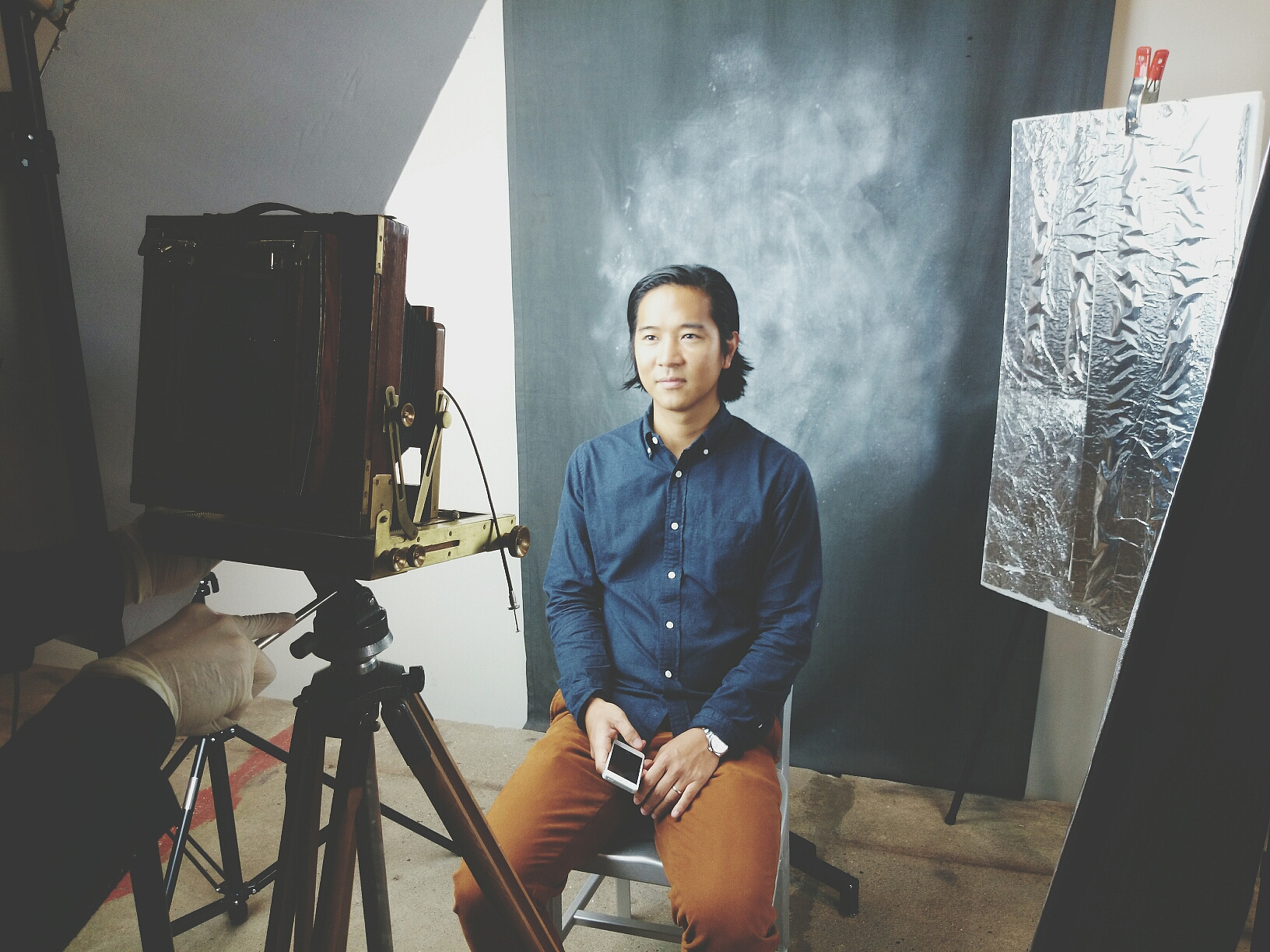 young man at retro photo studio