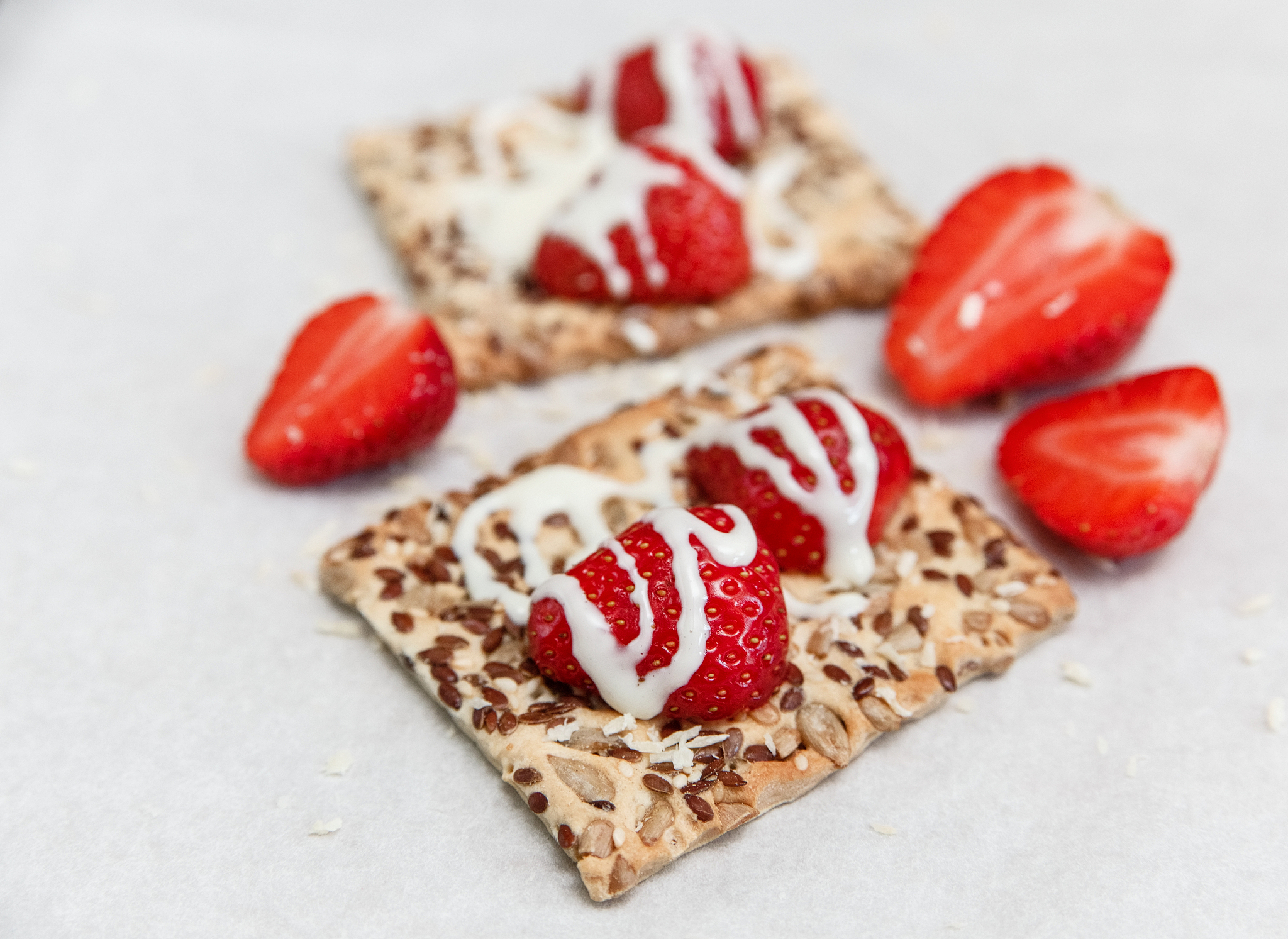 strawberries,cracker,condensed milk white paper.cooking ingredie