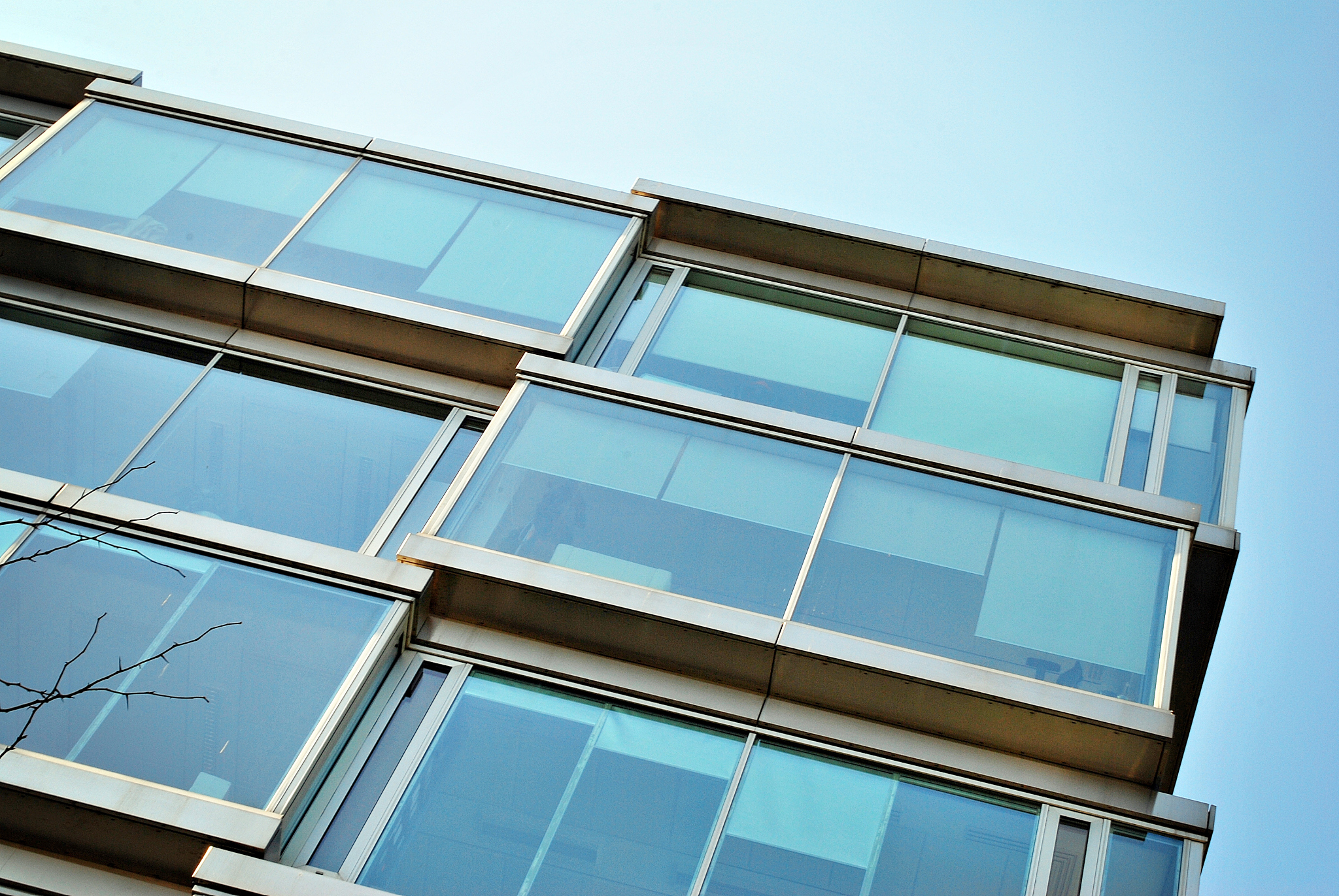 modern office building with facade of glass.