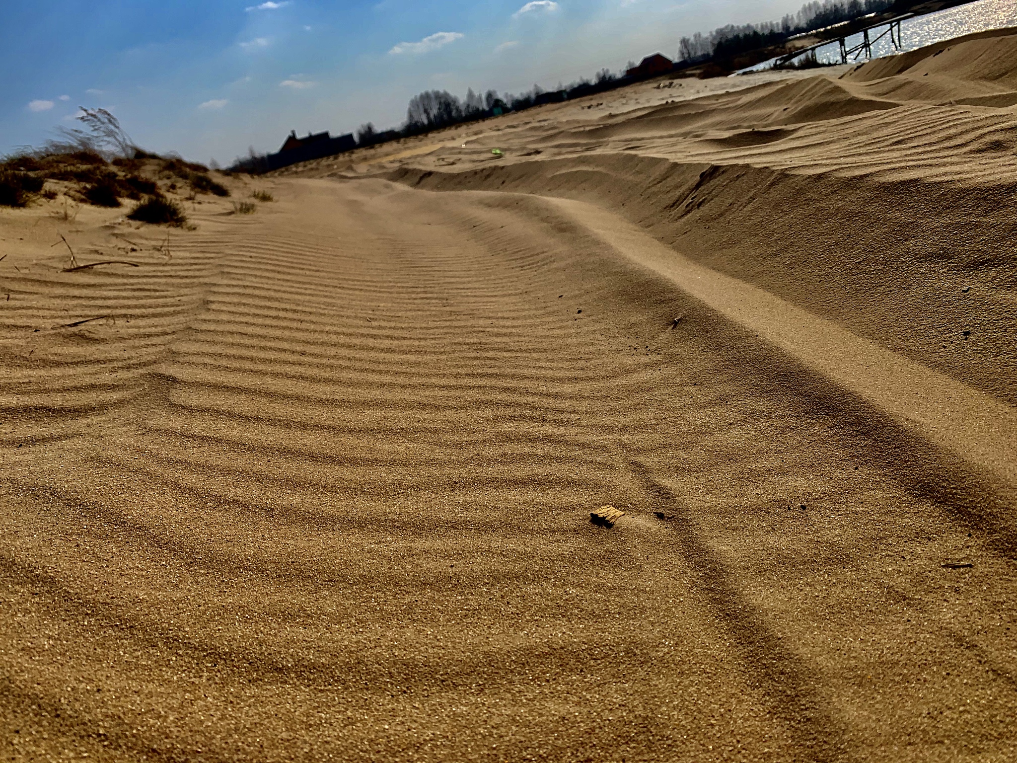 sand dunes in desert against sky
