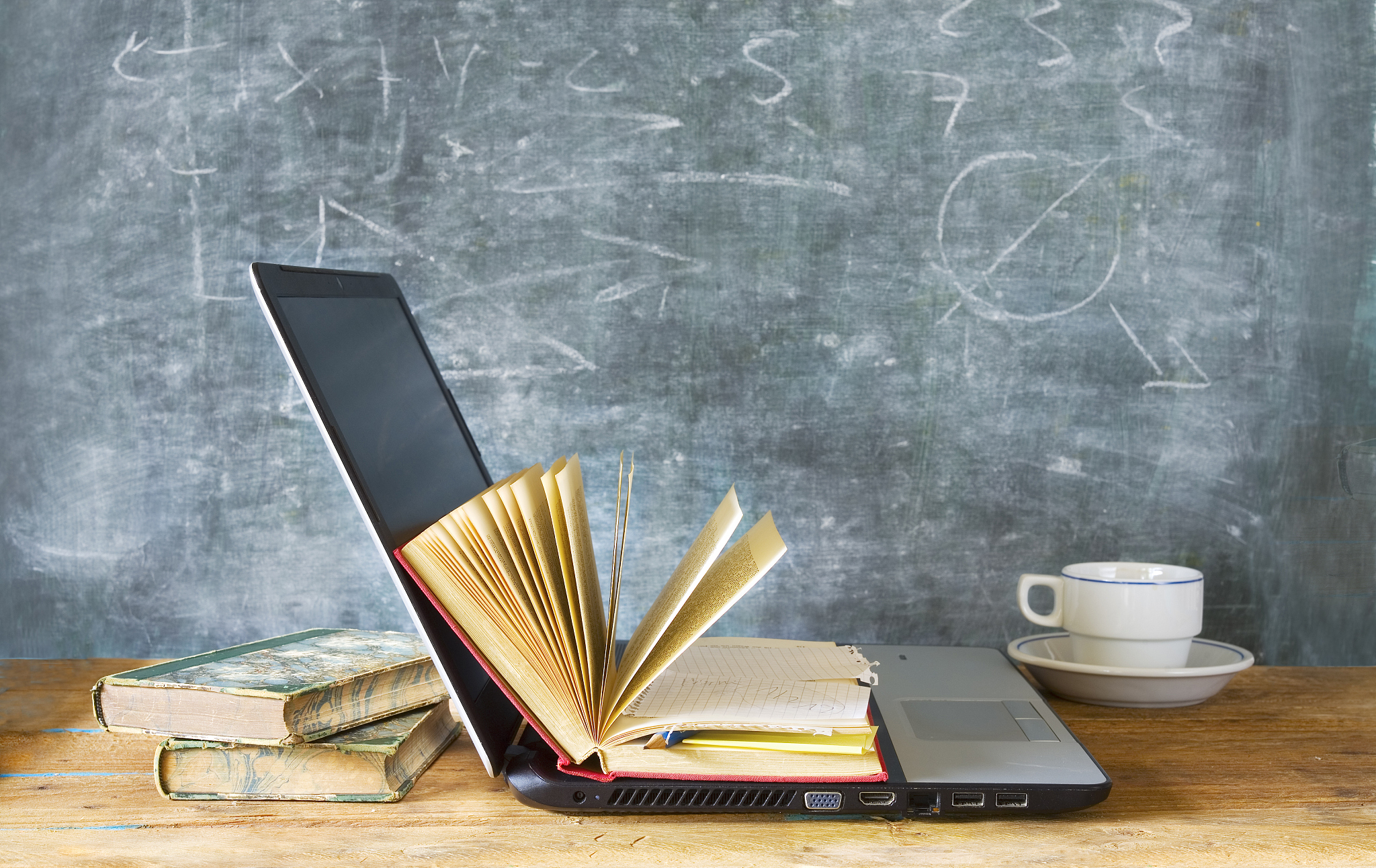 open book and laptop