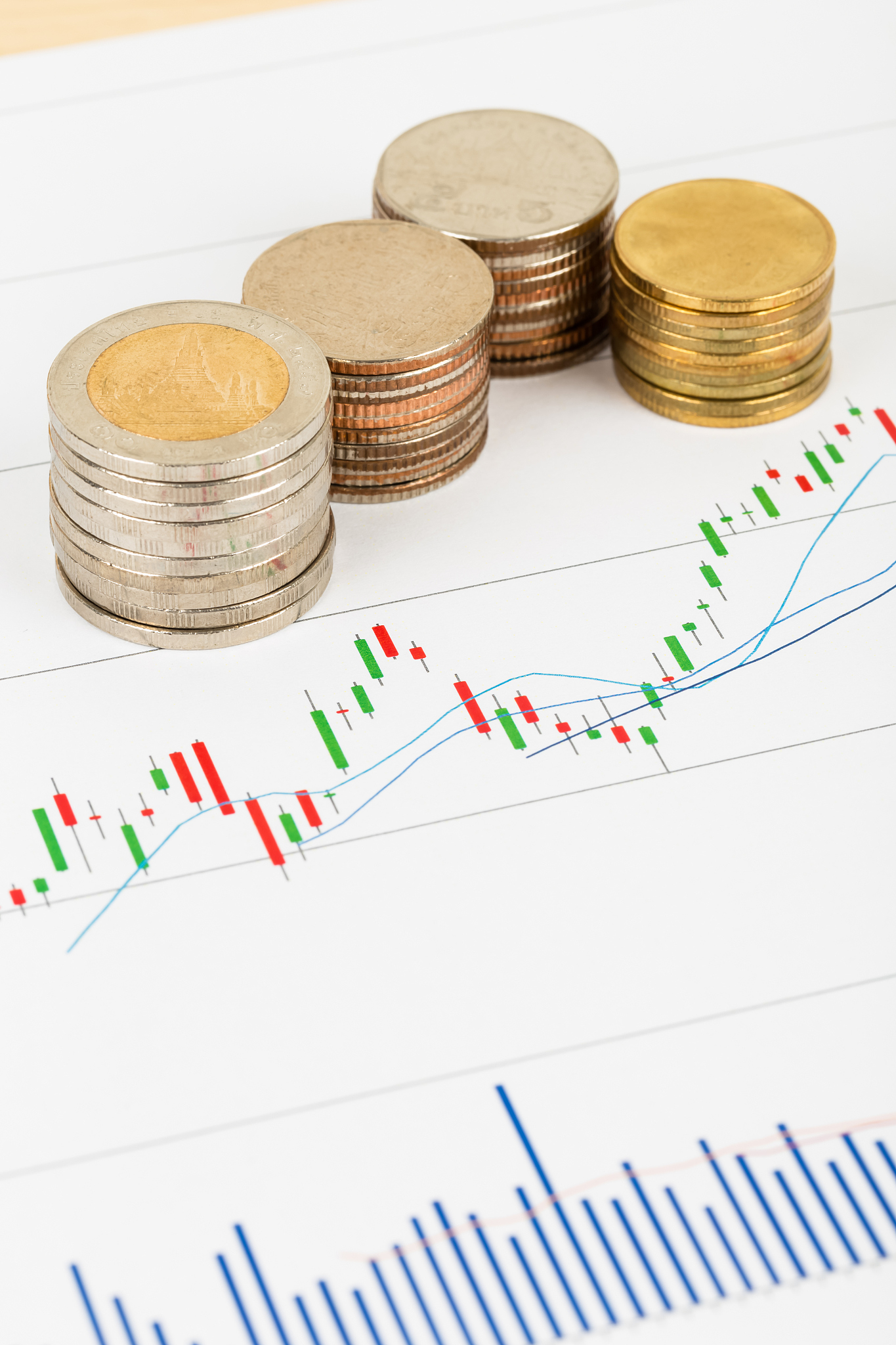 investment report with coin stack