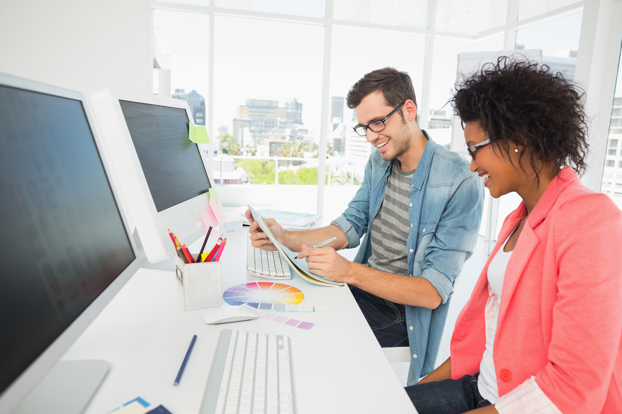 casual young couple working on computer