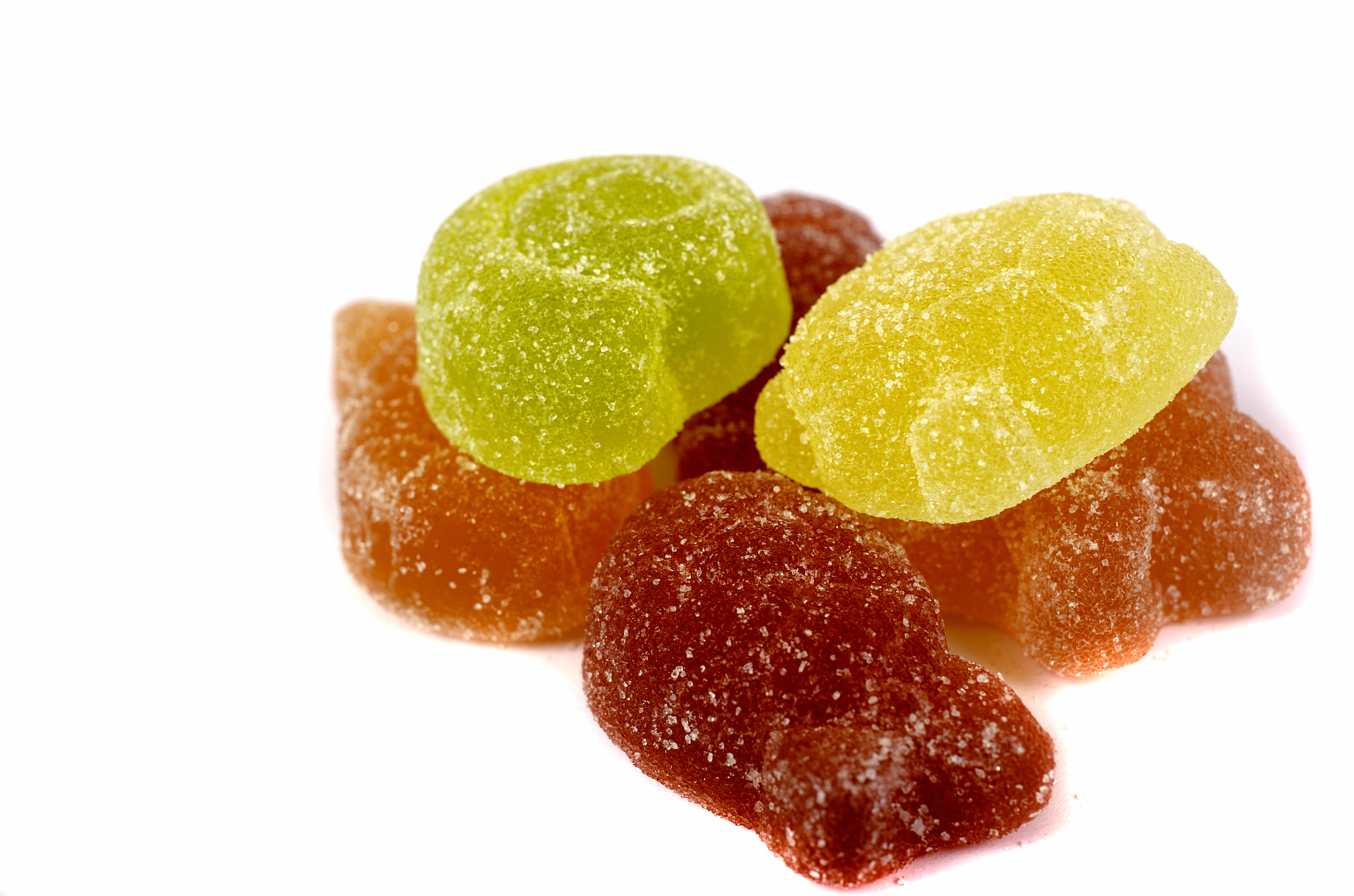 multicolored marmalade on white background.