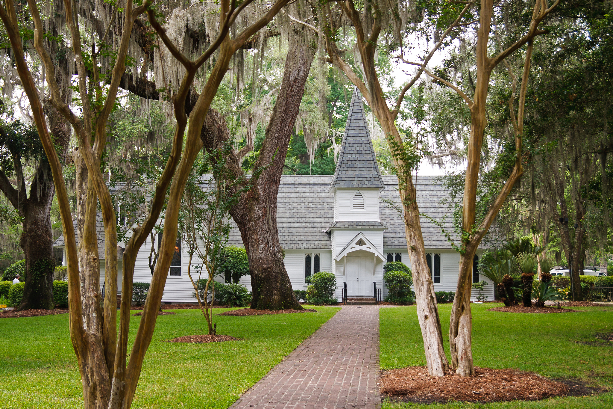 old white church under spanish moss