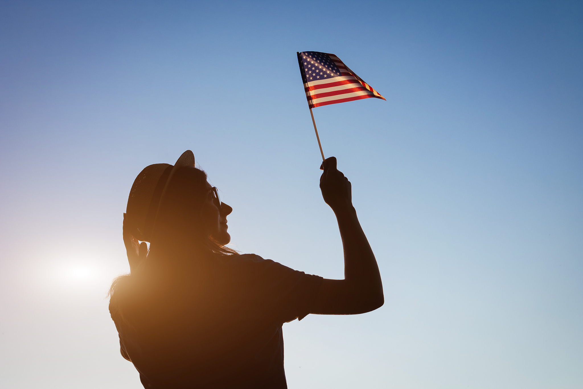 woman holding usa flag