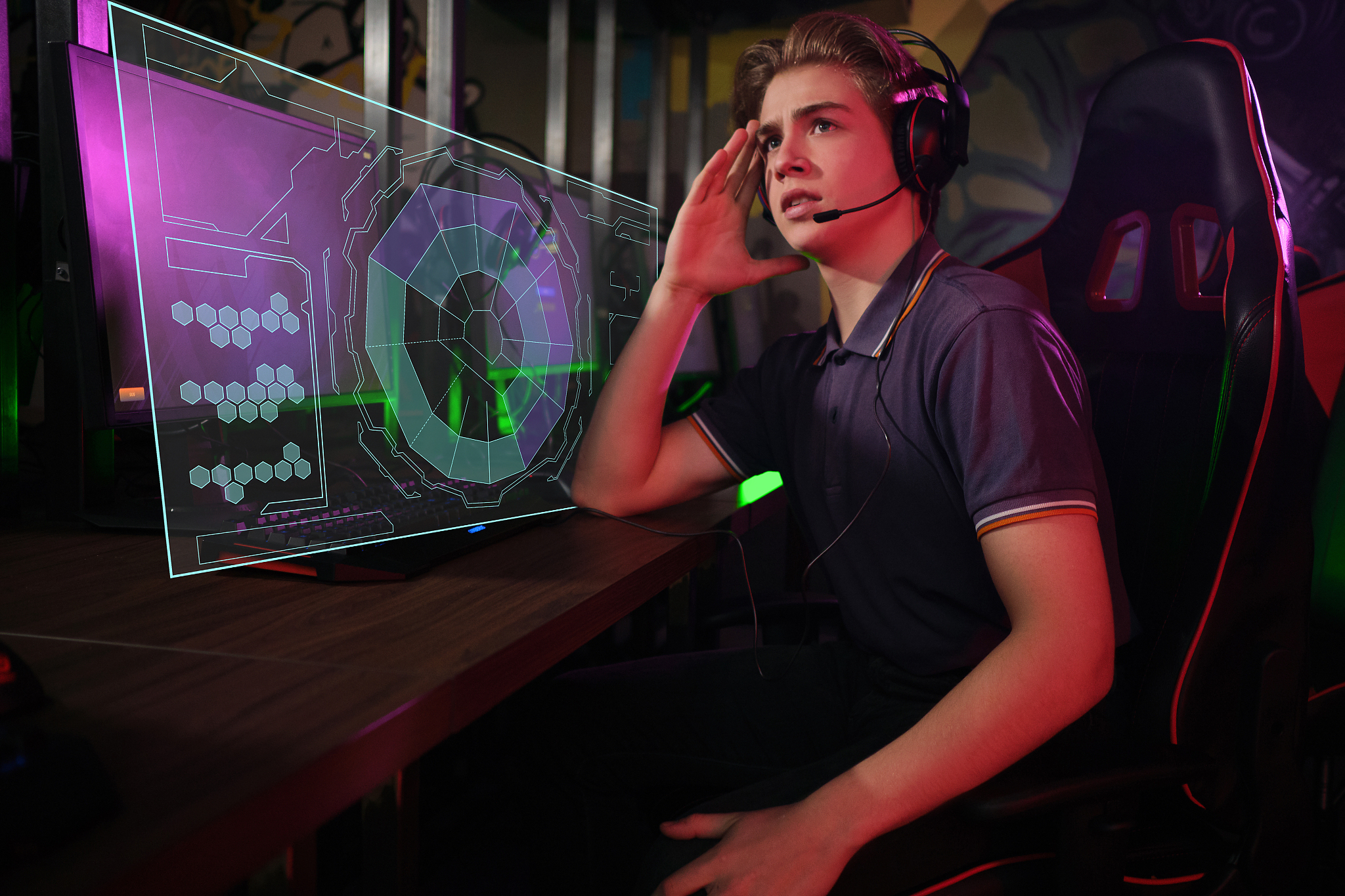 professional young caucasian gamer playing online on his pc. he 