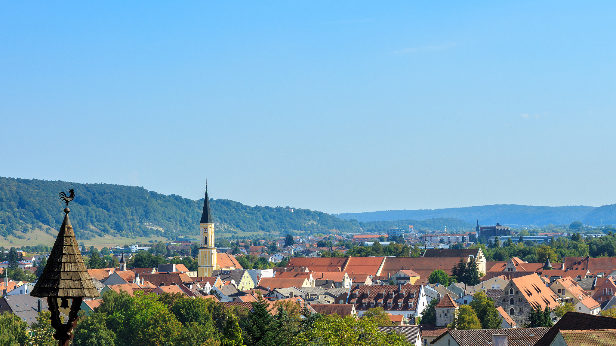 houses in town against clear blue sky
