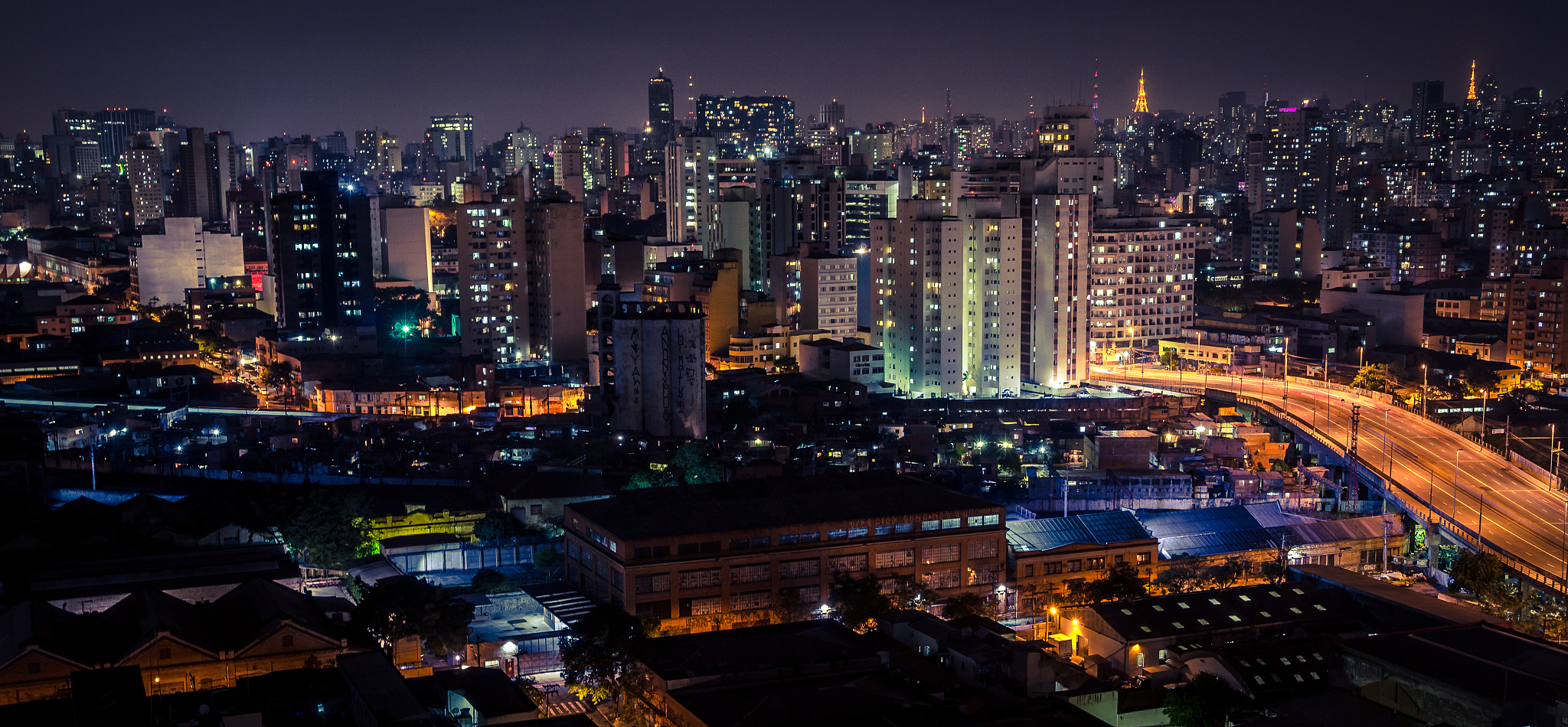aerial view of illuminated cityscape at night