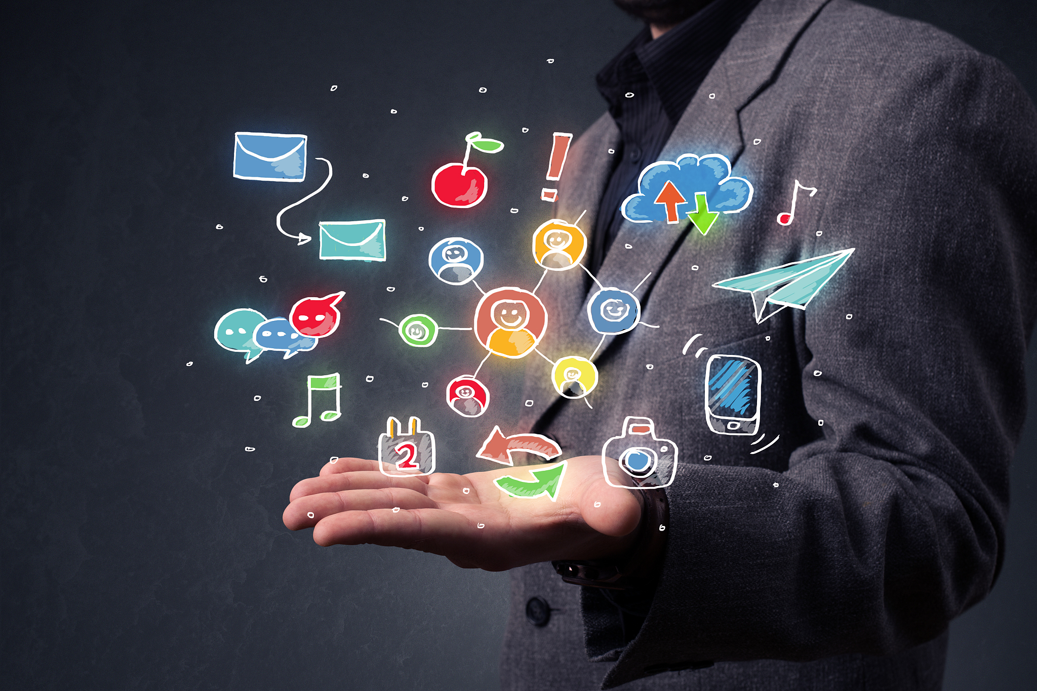 businessman holding colorful applications