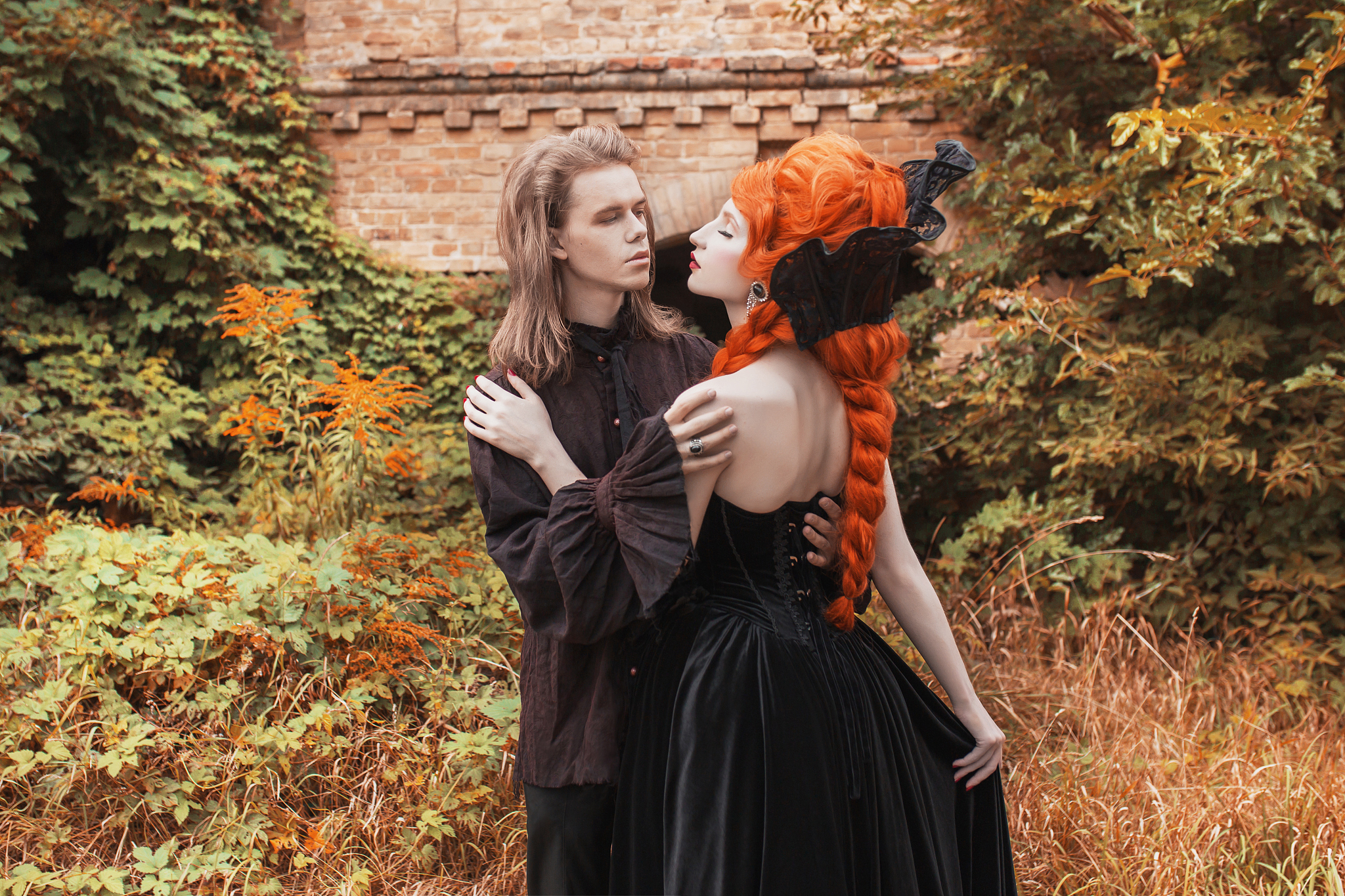 gothic couple in a halloween costume. pale undead vampire in edw