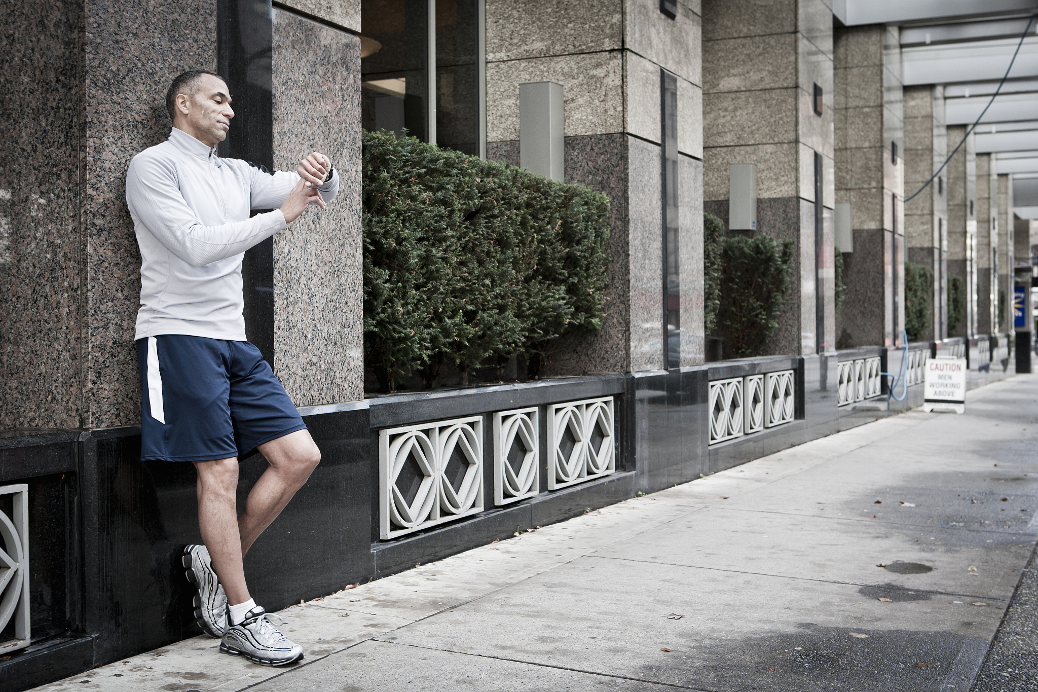 a runner stops to check his watch