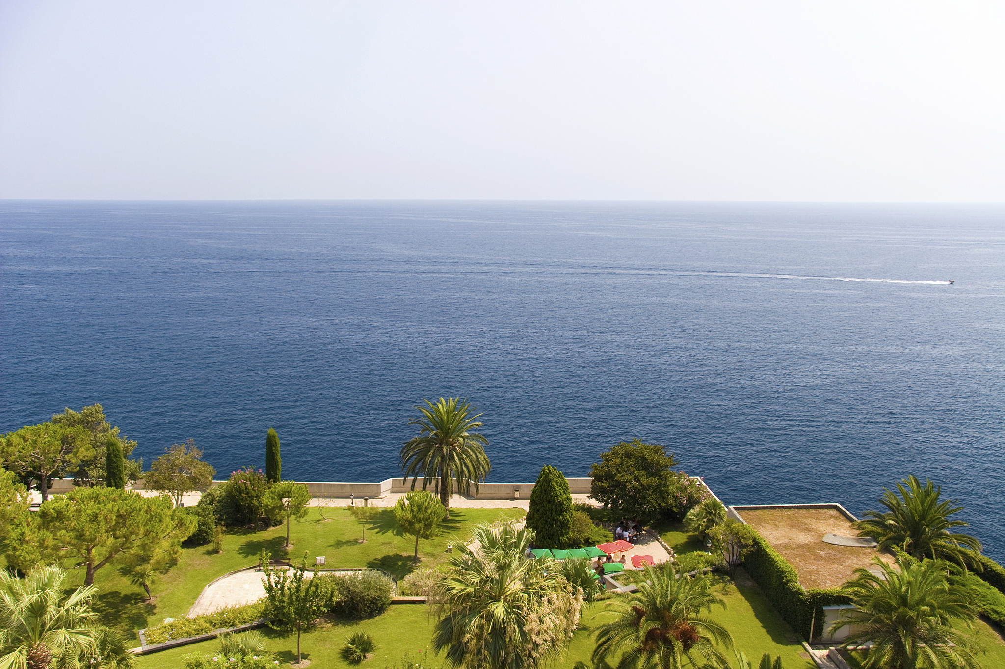 view on a sea and green park