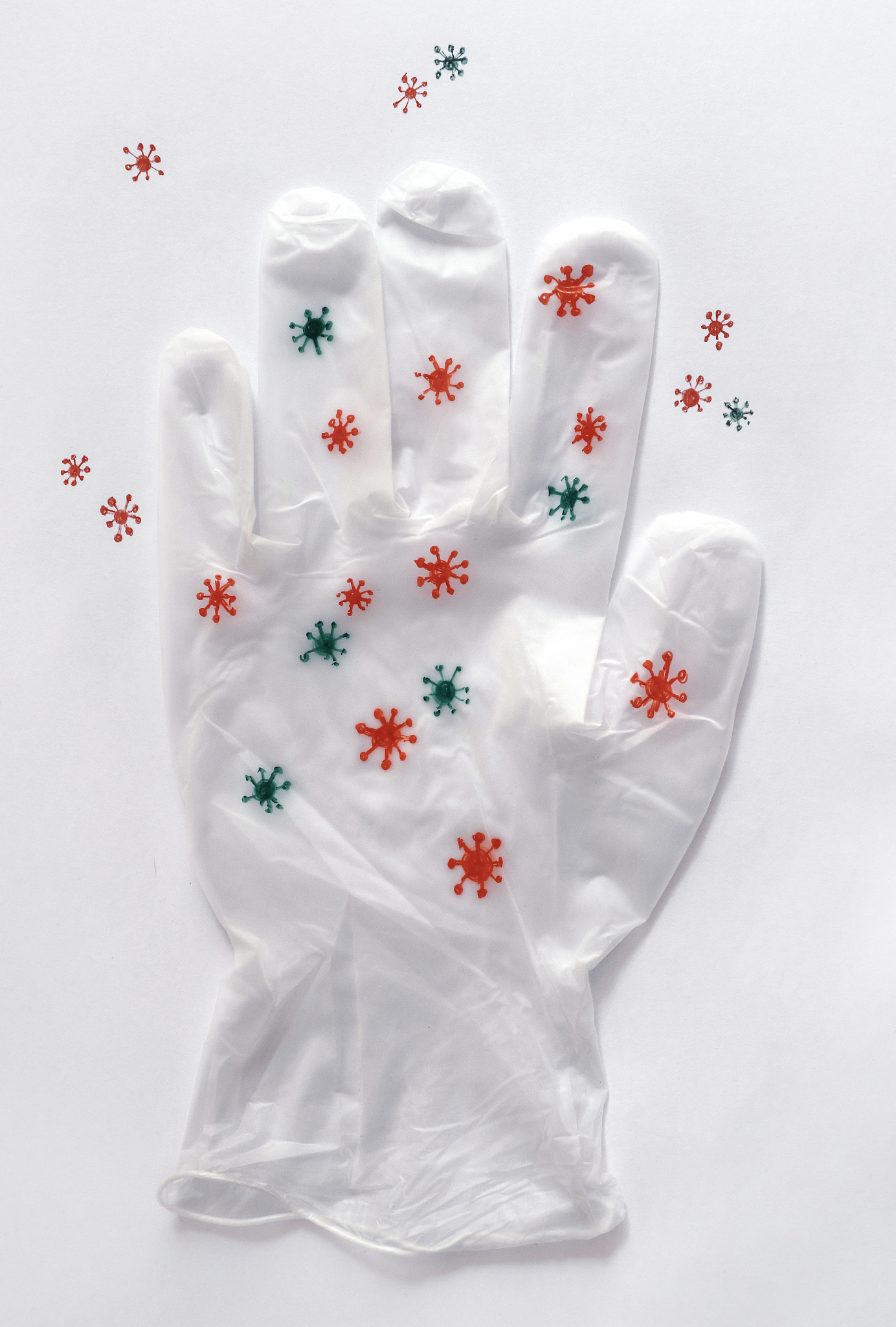 white glove with a virus signs.