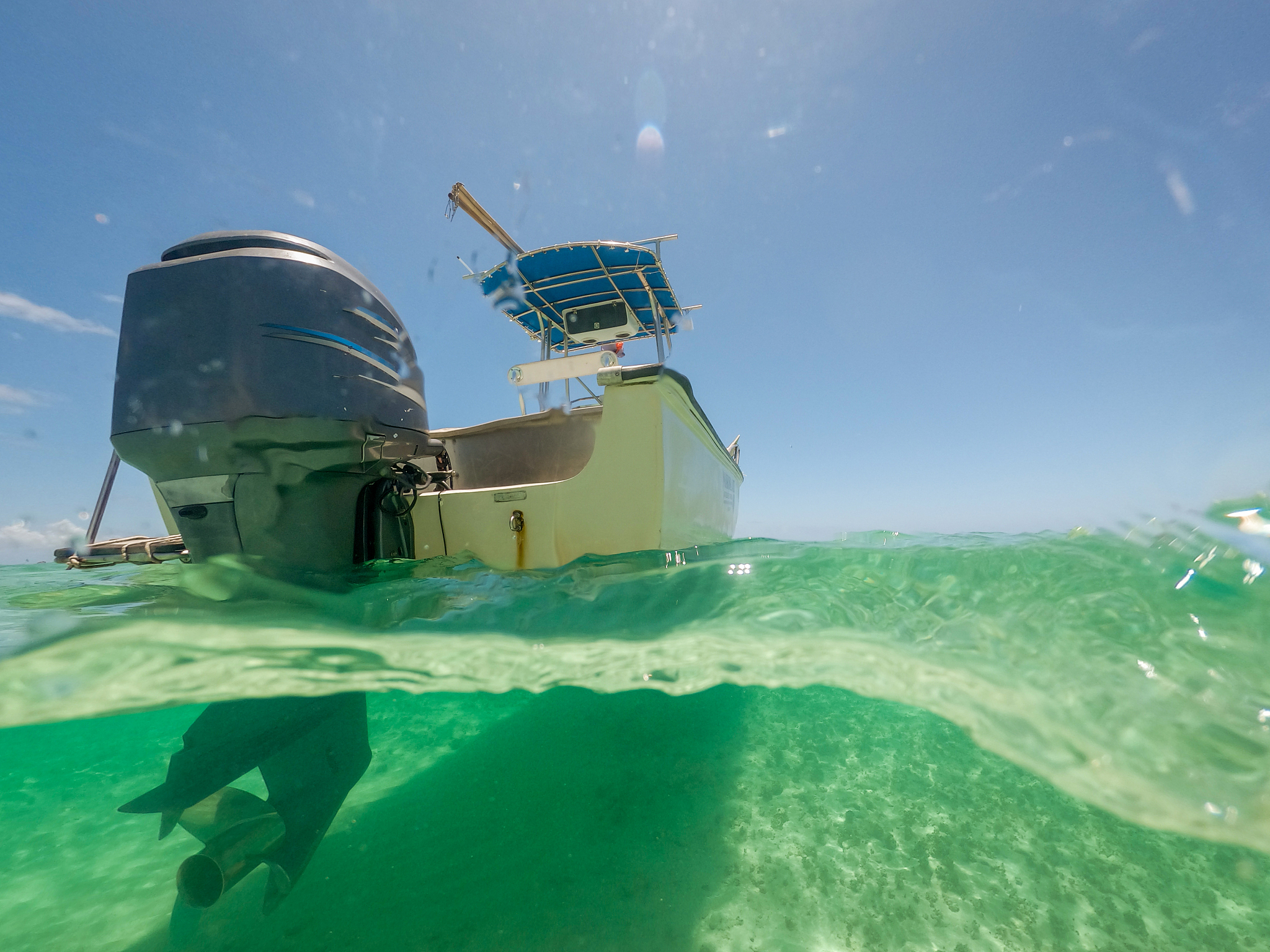 close-up split-shot of a boat floating in the water