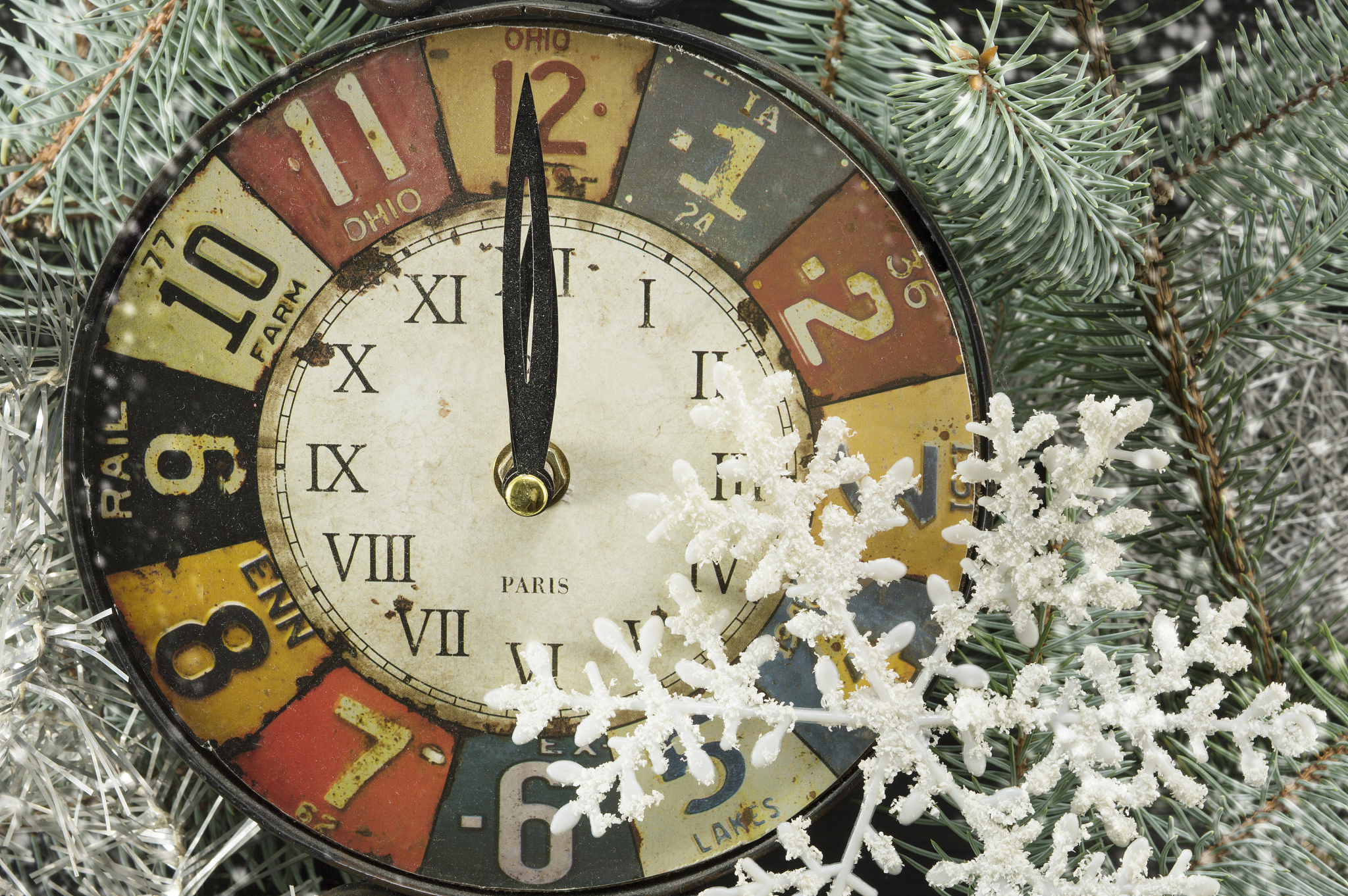 vintage clock for new years eve and snowflakes
