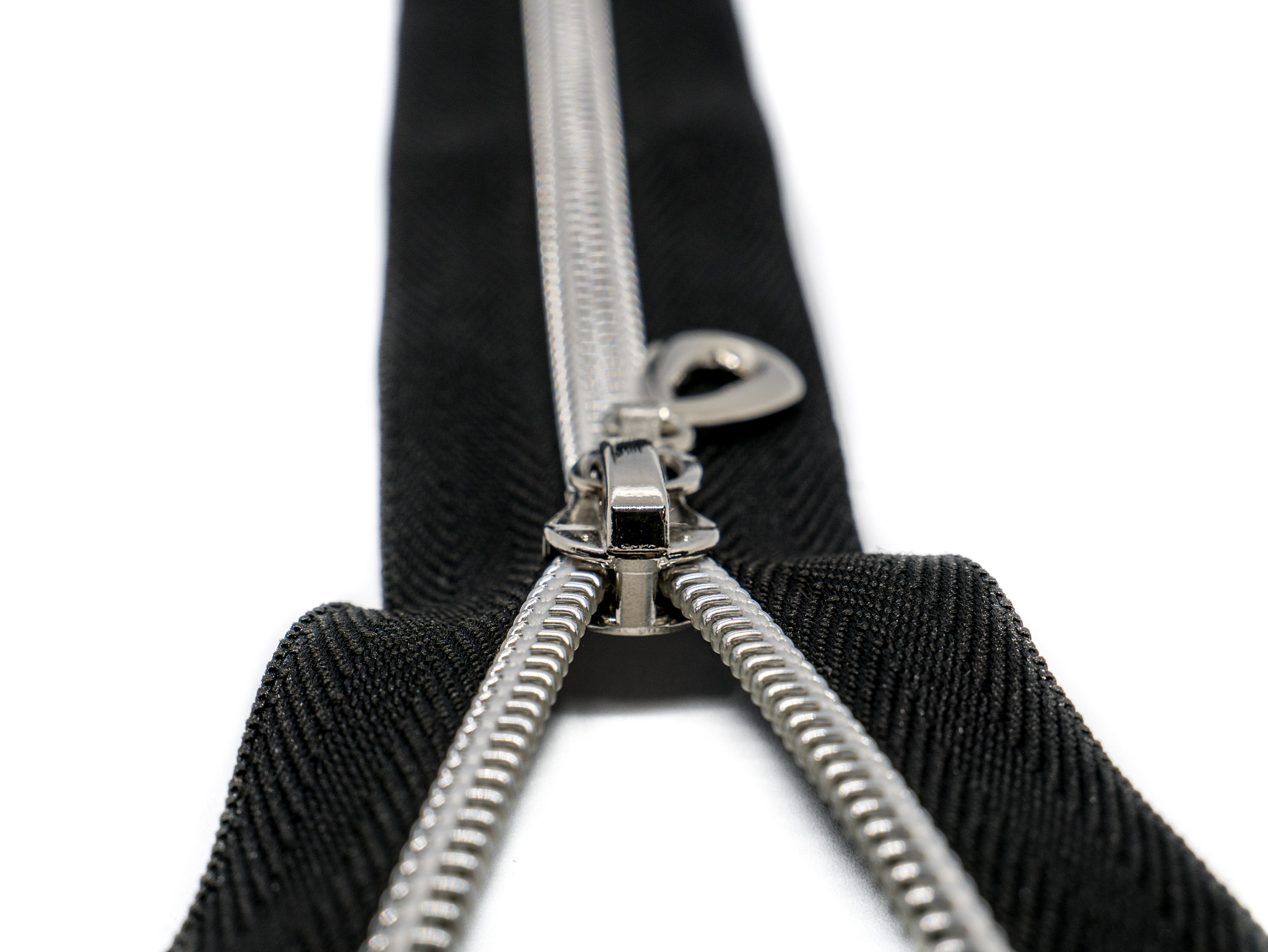 metal zipper for clothing isolated on white background.